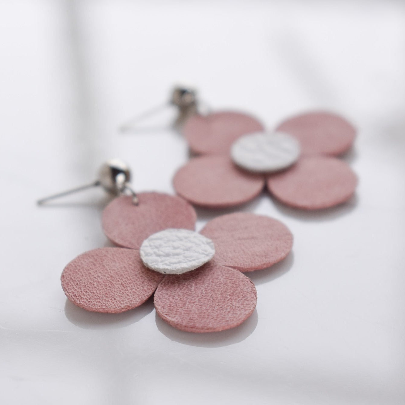 Handmade, light weight and comfortable to wear all day long leather earrings. All our earring hooks are made with a high quality stainless steel and they are hypo allergenic.  They will not tarnish or irritate your sensitive skin.