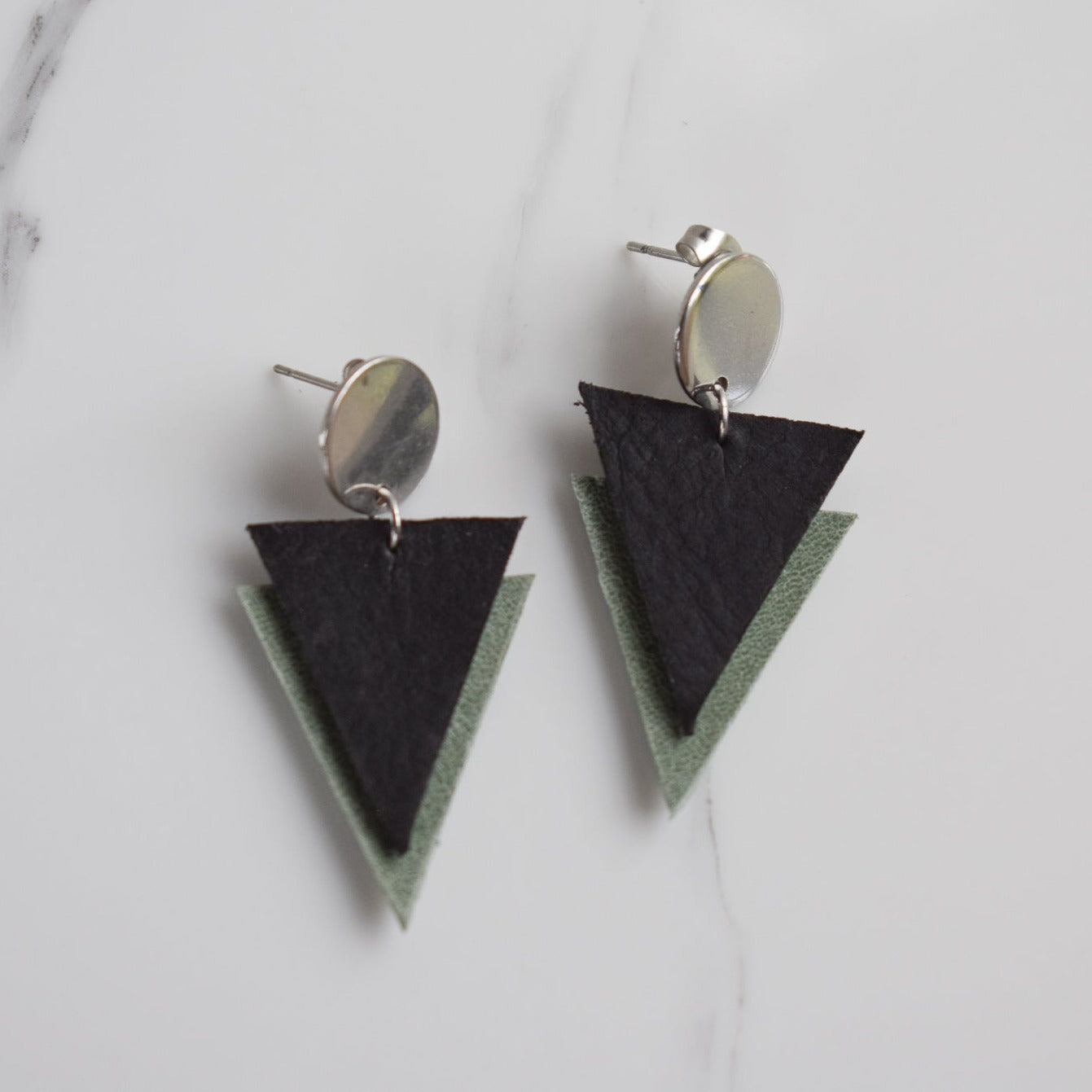 Handmade, light weight and comfortable to wear all day long leather earrings. All our earring hooks are made with a high quality stainless steel and they are hypo allergenic.  They will not tarnish or irritate your sensitive skin.