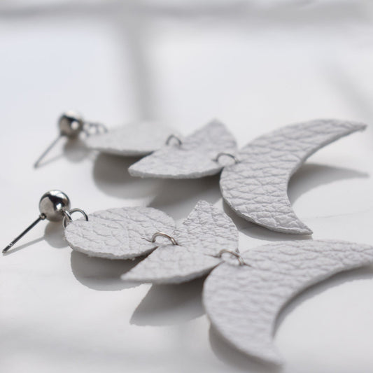 Handmade, light weight and comfortable to wear all day long leather earrings. All our earring hooks are made with a high quality stainless steel and they are hypo allergenic.  They will not tarnish or irritate your sensitive skin.