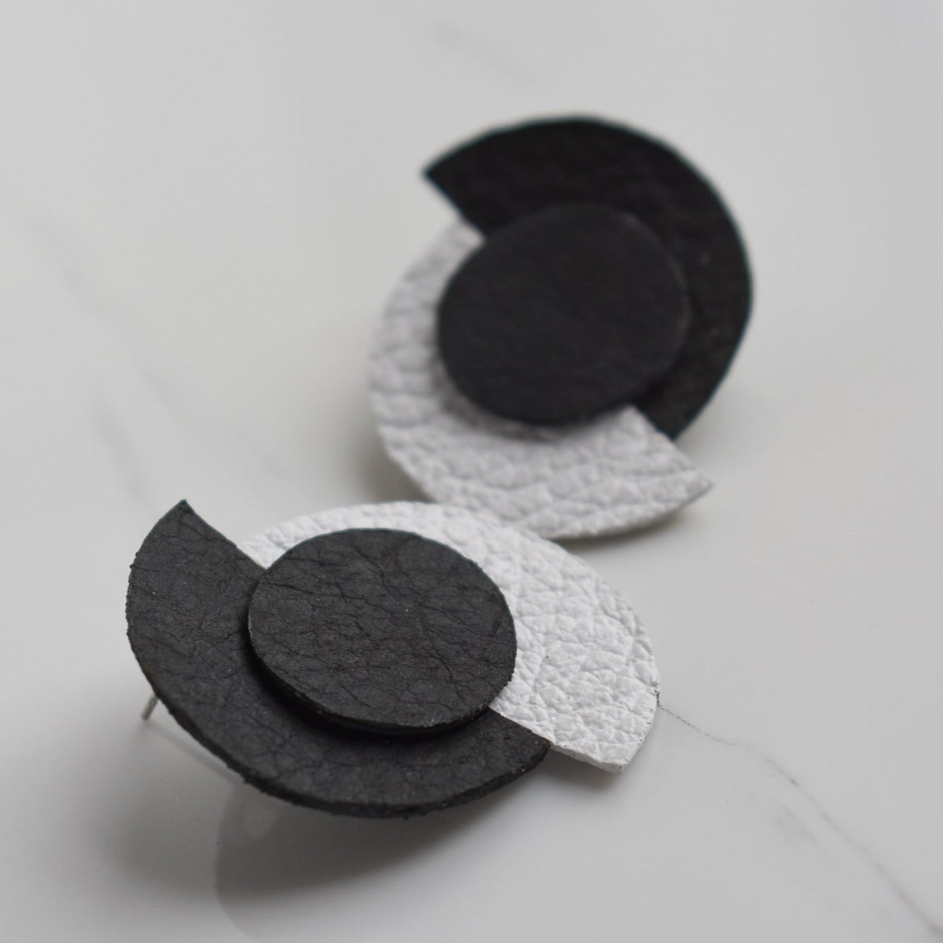 Handmade, light weight and comfortable to wear all day long leather earrings. All our earring hooks are made with a high quality stainless steel and they are hypo allergenic.  They will not tarnish or irritate your sensitive skin.