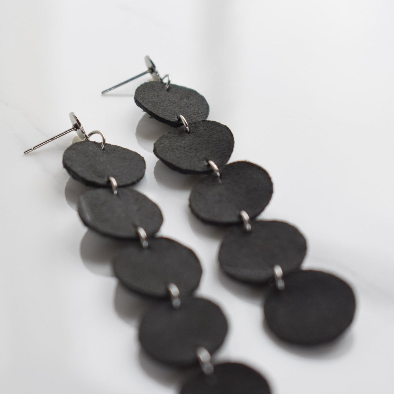 Handmade, light weight and comfortable to wear all day long leather earrings. All our earring hooks are made with a high quality stainless steel and they are hypo allergenic.  They will not tarnish or irritate your sensitive skin.