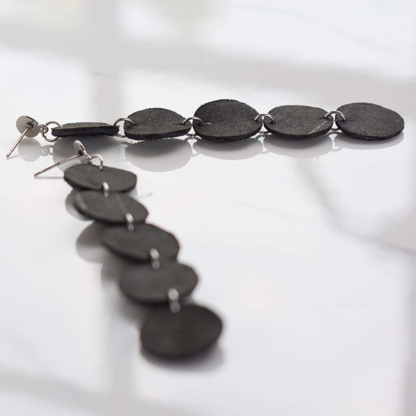 Handmade, light weight and comfortable to wear all day long leather earrings. All our earring hooks are made with a high quality stainless steel and they are hypo allergenic.  They will not tarnish or irritate your sensitive skin.