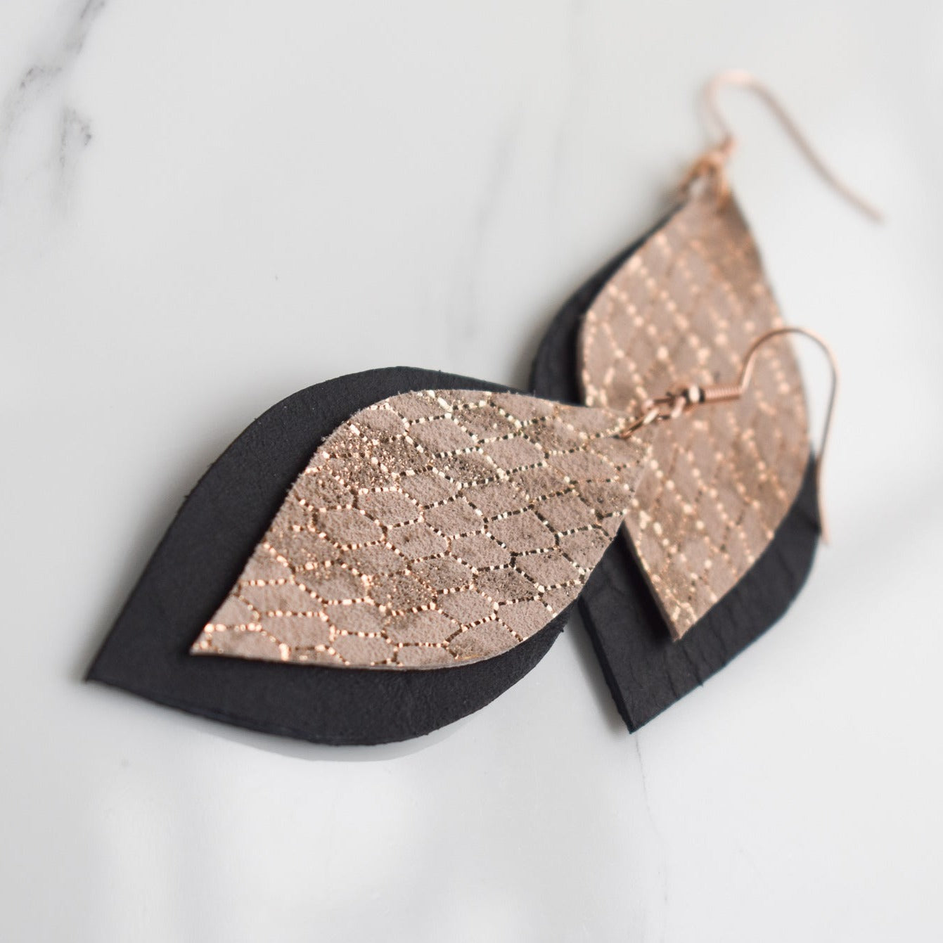 Handmade, light weight and comfortable to wear all day long leather earrings. All our earring hooks are made with a high quality stainless steel and they are hypo allergenic.  They will not tarnish or irritate your sensitive skin.