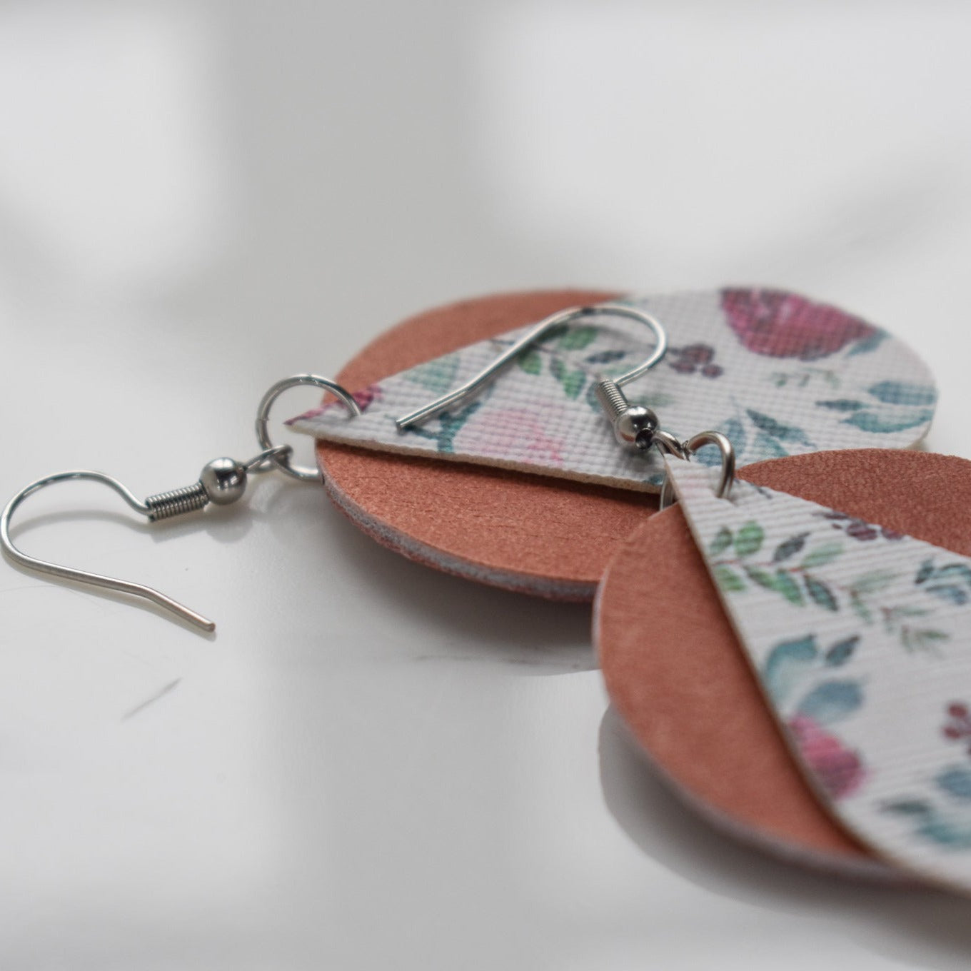 Handmade, light weight and comfortable to wear all day long leather earrings. All our earring hooks are made with a high quality stainless steel and they are hypo allergenic.  They will not tarnish or irritate your sensitive skin.