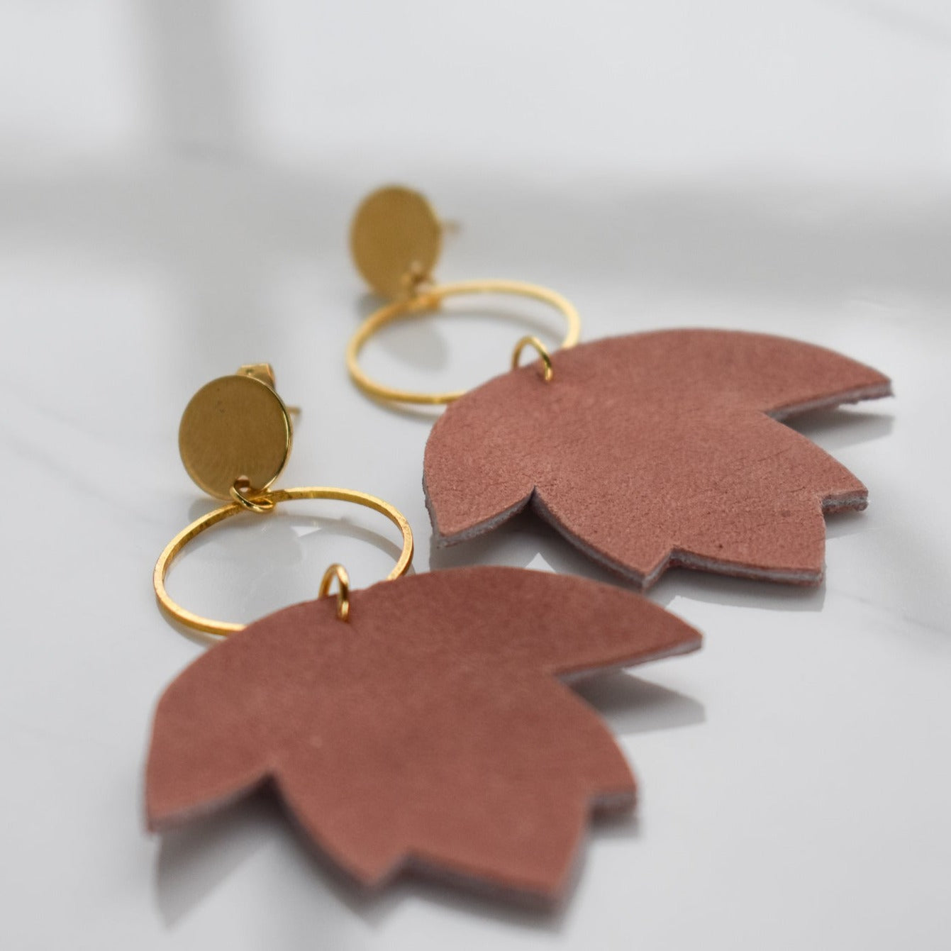 Handmade, light weight and comfortable to wear all day long leather earrings. All our earring hooks are made with a high quality stainless steel and they are hypo allergenic.  They will not tarnish or irritate your sensitive skin.