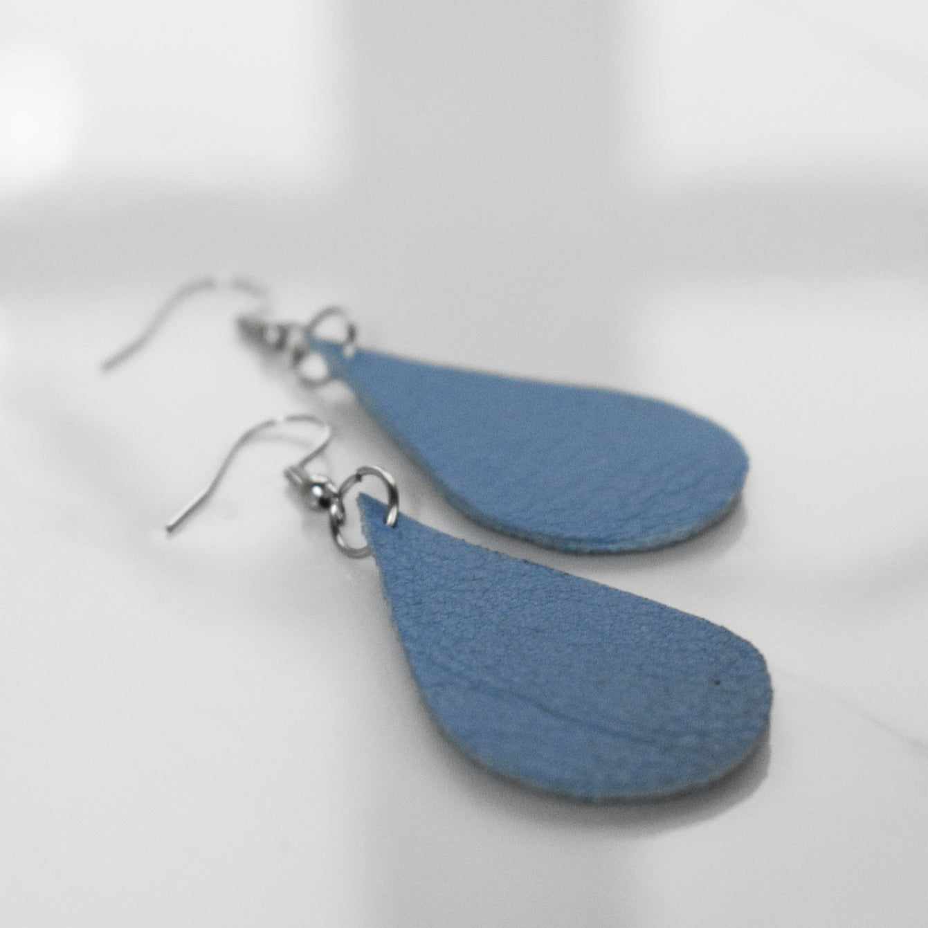 Handmade, light weight and comfortable to wear all day long leather earrings. All our earring hooks are made with a high quality stainless steel and they are hypo allergenic.  They will not tarnish or irritate your sensitive skin.