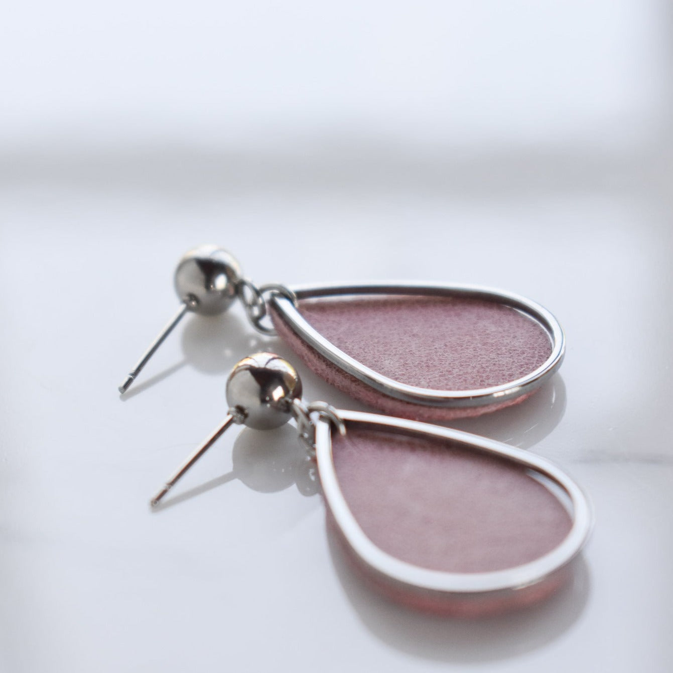 Handmade, light weight and comfortable to wear all day long leather earrings. All our earring hooks are made with a high quality stainless steel and they are hypo allergenic.  They will not tarnish or irritate your sensitive skin.