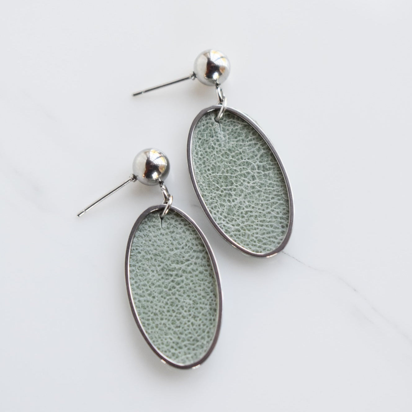 Handmade, light weight and comfortable to wear all day long leather earrings. All our earring hooks are made with a high quality stainless steel and they are hypo allergenic.  They will not tarnish or irritate your sensitive skin.