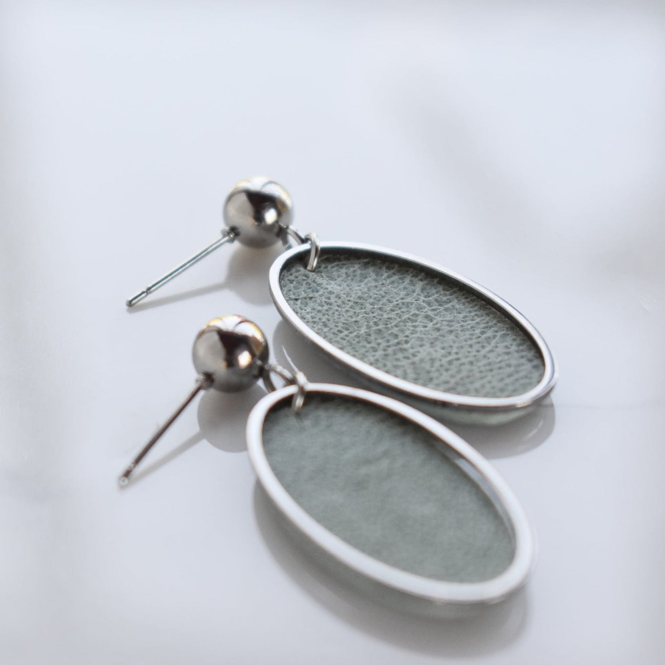 Handmade, light weight and comfortable to wear all day long leather earrings. All our earring hooks are made with a high quality stainless steel and they are hypo allergenic.  They will not tarnish or irritate your sensitive skin.