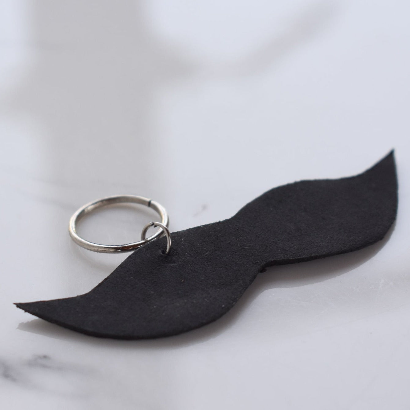 Beautifully hand made leather keychain. A perfect addition to a gift or a great thank you gift for a wedding. 