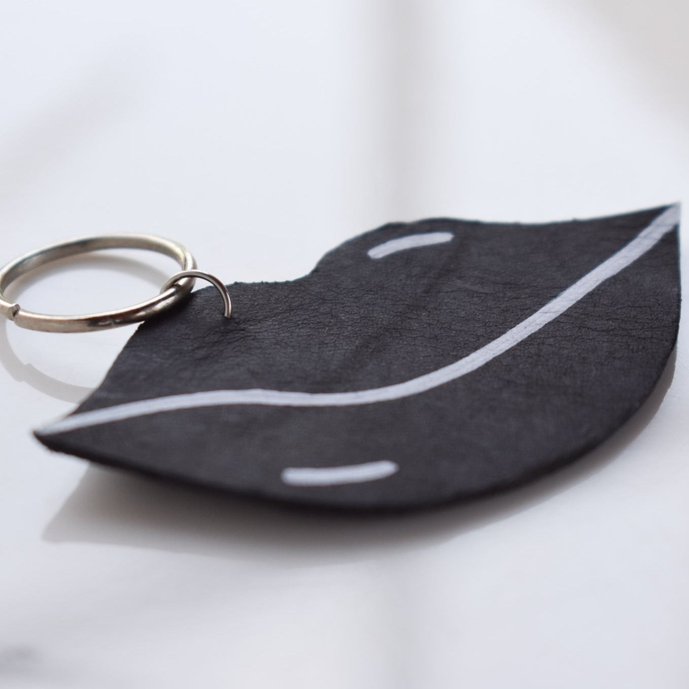 Beautifully hand made leather keychain. A perfect addition to a gift or a great thank you gift for a wedding. 