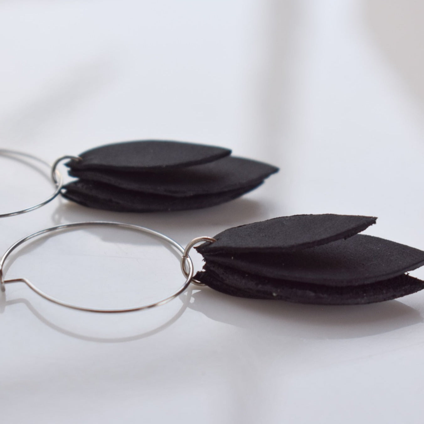 Handmade, light weight and comfortable to wear all day long leather earrings. All our earring hooks are made with a high quality stainless steel and they are hypo allergenic.  They will not tarnish or irritate your sensitive skin.