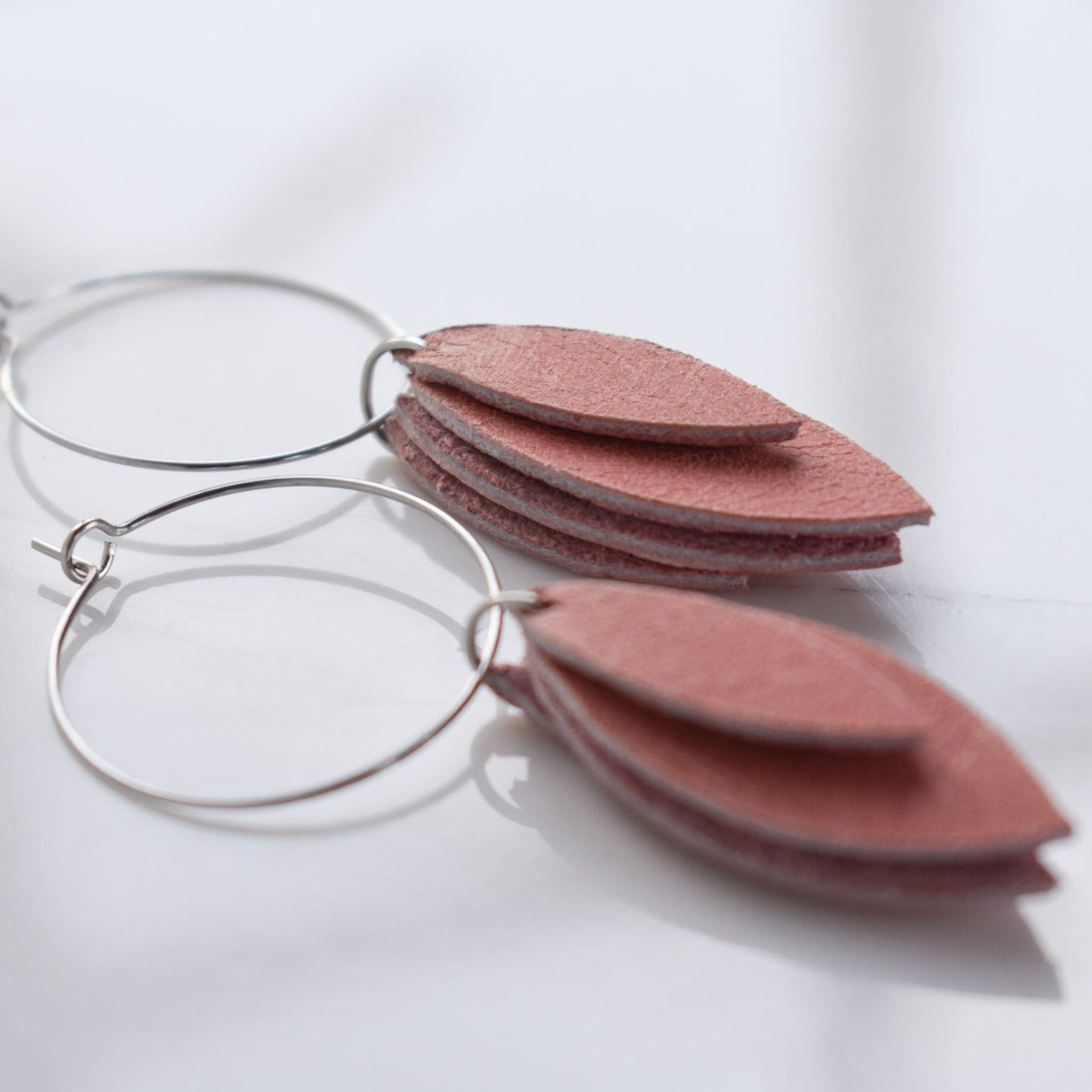 Handmade, light weight and comfortable to wear all day long leather earrings. All our earring hooks are made with a high quality stainless steel and they are hypo allergenic.  They will not tarnish or irritate your sensitive skin.