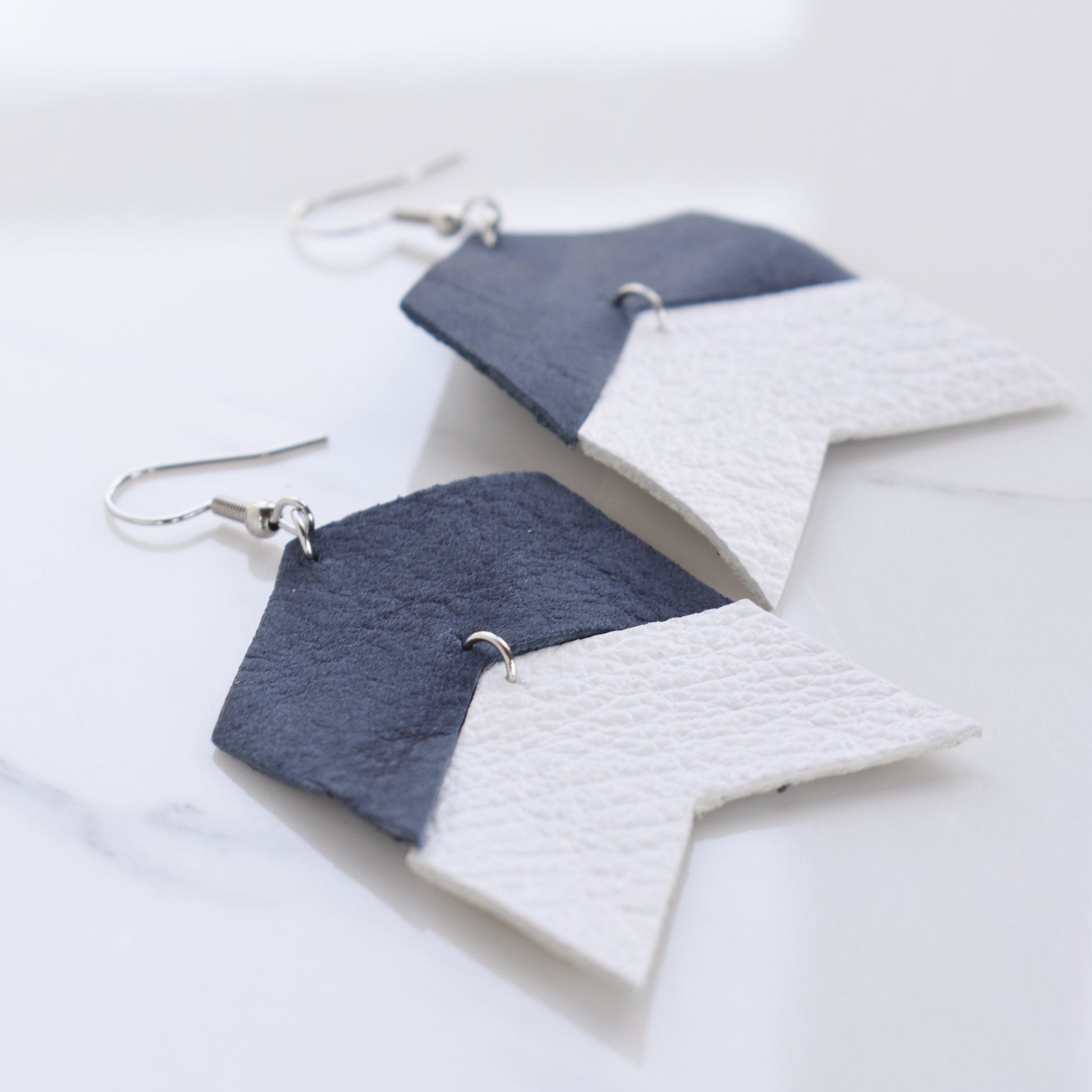 Handmade, light weight and comfortable to wear all day long leather earrings. All our earring hooks are made with a high quality stainless steel and they are hypo allergenic.  They will not tarnish or irritate your sensitive skin.