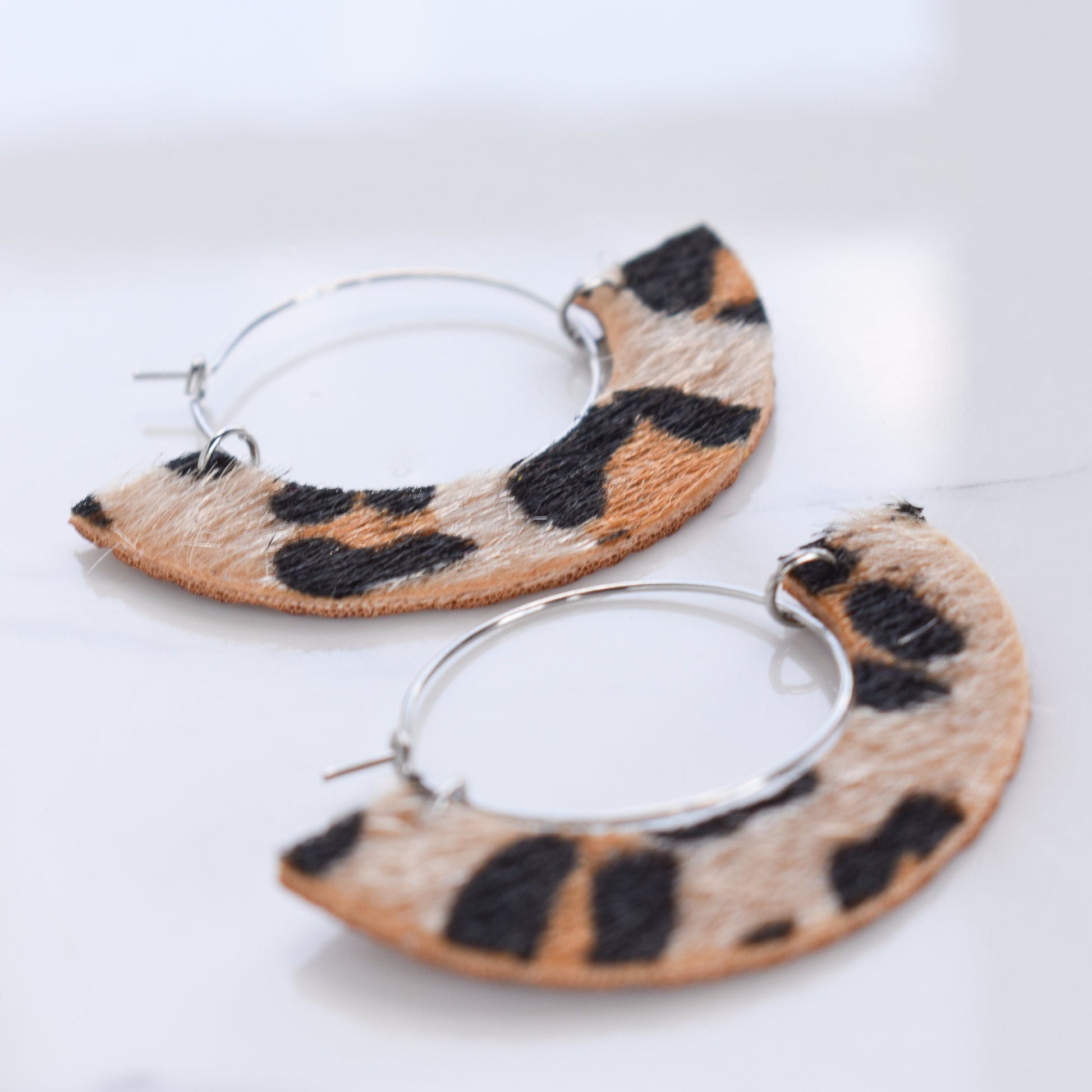 Handmade, light weight and comfortable to wear all day long leather earrings. All our earring hooks are made with a high quality stainless steel and they are hypo allergenic.  They will not tarnish or irritate your sensitive skin.