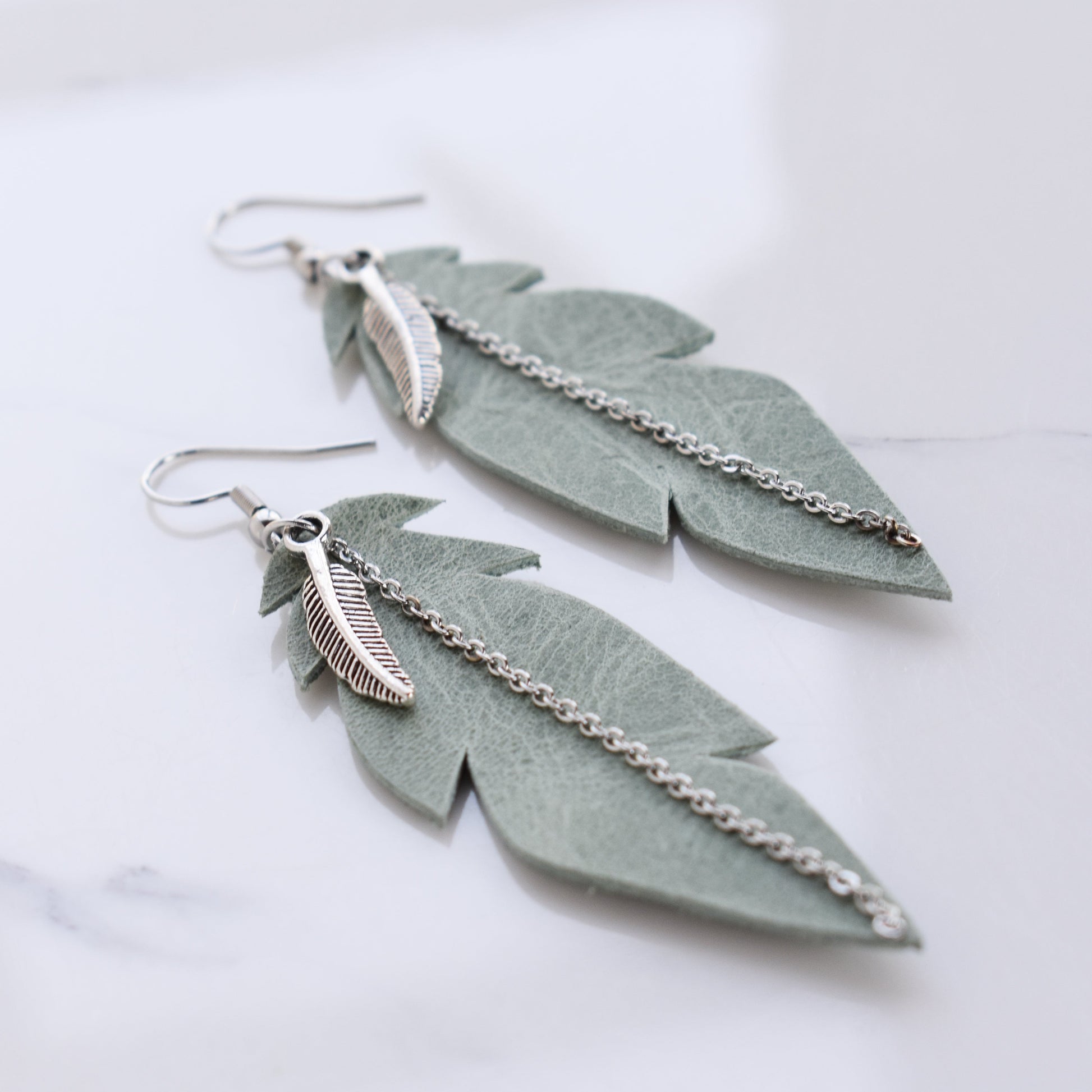 Handmade, light weight and comfortable to wear all day long leather earrings. All our earring hooks are made with a high quality stainless steel and they are hypo allergenic.  They will not tarnish or irritate your sensitive skin.