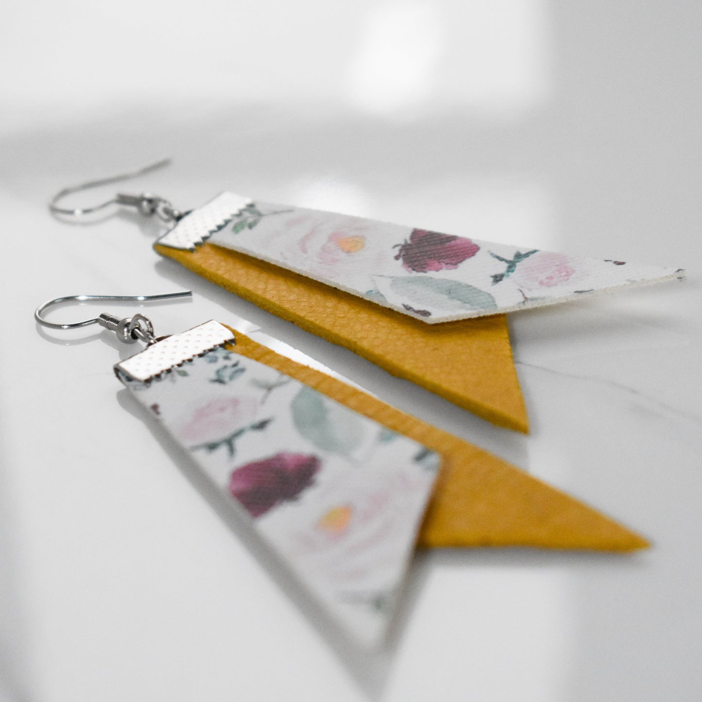 Handmade, light weight and comfortable to wear all day long leather earrings. All our earring hooks are made with a high quality stainless steel and they are hypo allergenic.  They will not tarnish or irritate your sensitive skin.