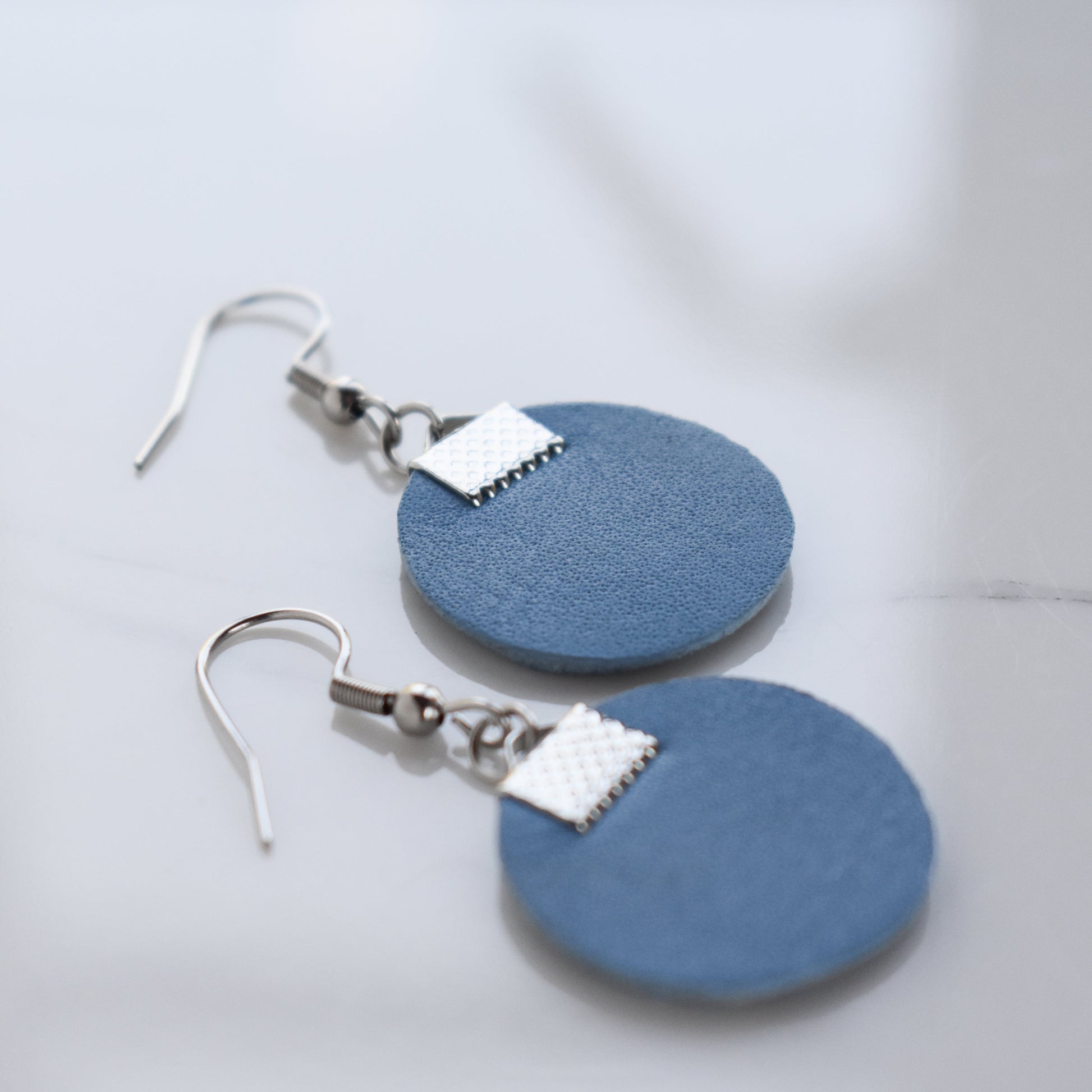 Handmade, light weight and comfortable to wear all day long leather earrings. All our earring hooks are made with a high quality stainless steel and they are hypo allergenic.  They will not tarnish or irritate your sensitive skin.