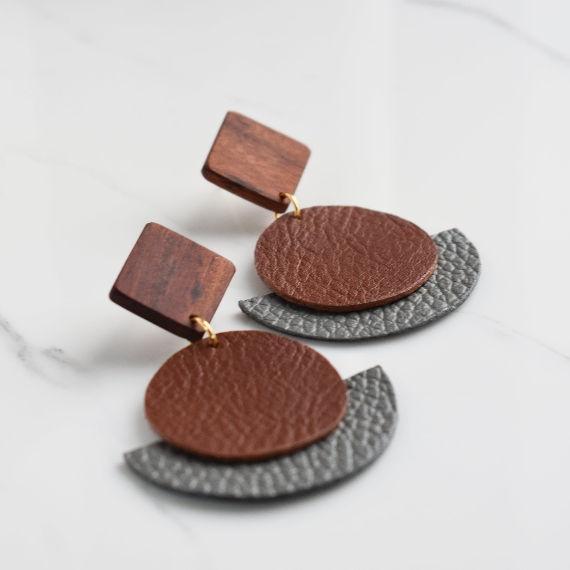 Handmade, light weight and comfortable to wear all day long leather earrings. All our earring hooks are made with a high quality stainless steel and they are hypo allergenic.  They will not tarnish or irritate your sensitive skin.