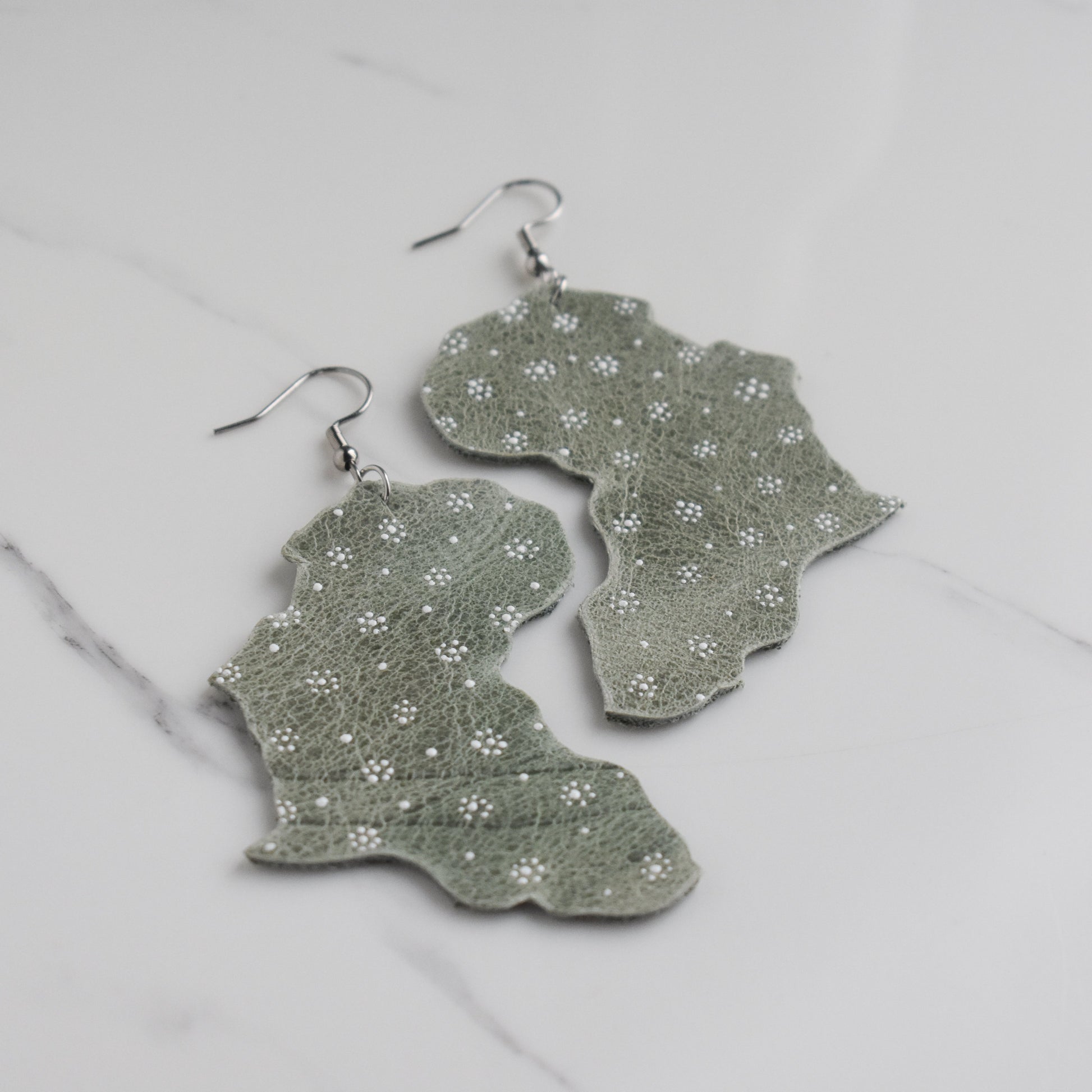 Handmade, light weight and comfortable to wear all day long leather earrings. All our earring hooks are made with a high quality stainless steel and they are hypo allergenic.  They will not tarnish or irritate your sensitive skin.