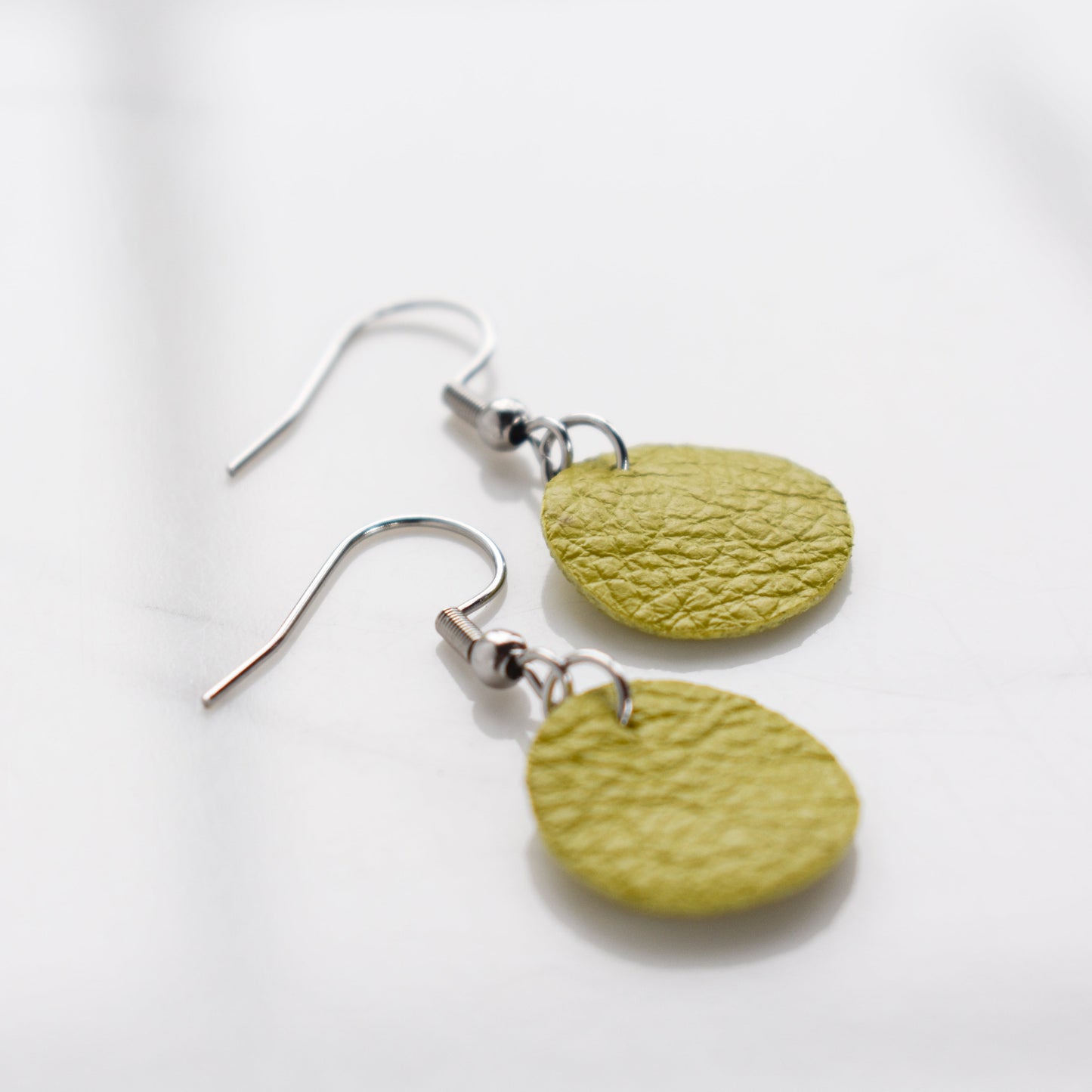 Handmade, light weight and comfortable to wear all day long leather earrings. All our earring hooks are made with a high quality stainless steel and they are hypo allergenic.  They will not tarnish or irritate your sensitive skin.