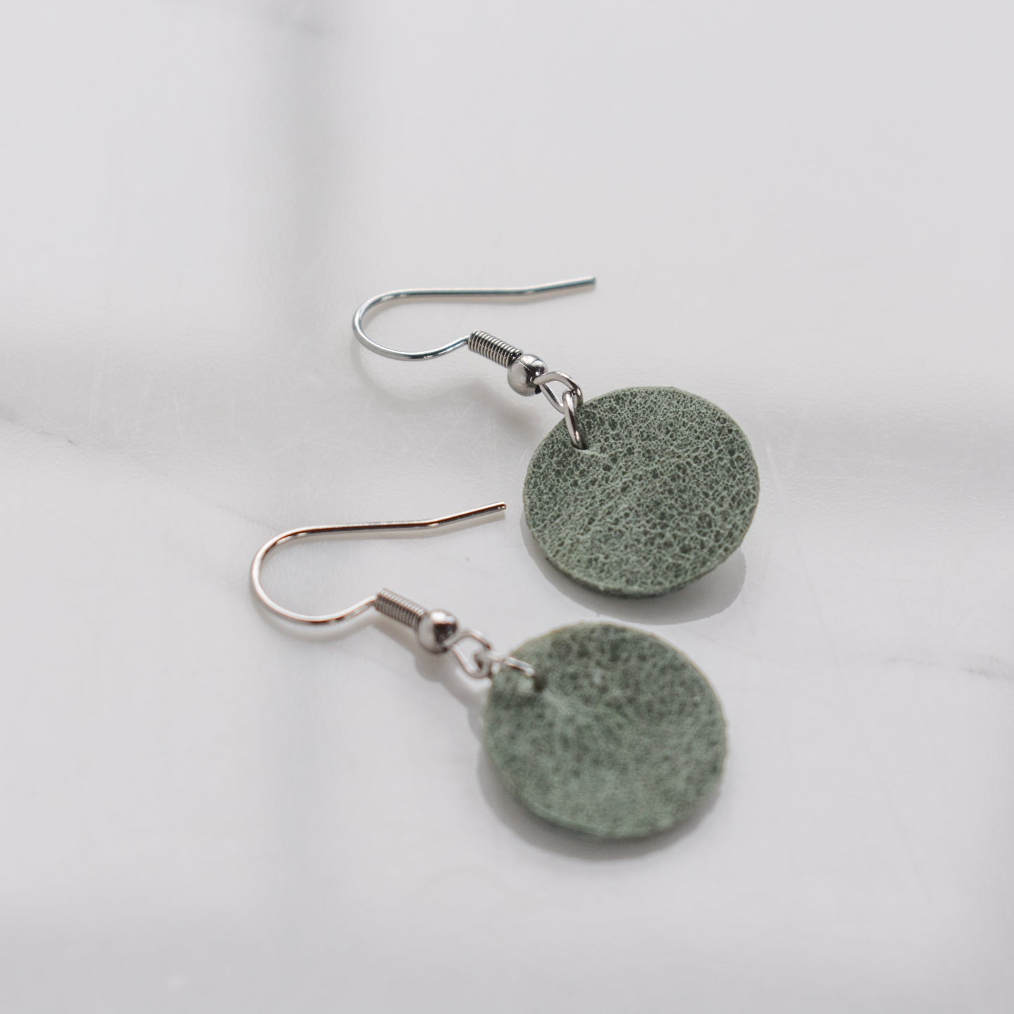 Handmade, light weight and comfortable to wear all day long leather earrings. All our earring hooks are made with a high quality stainless steel and they are hypo allergenic.  They will not tarnish or irritate your sensitive skin.