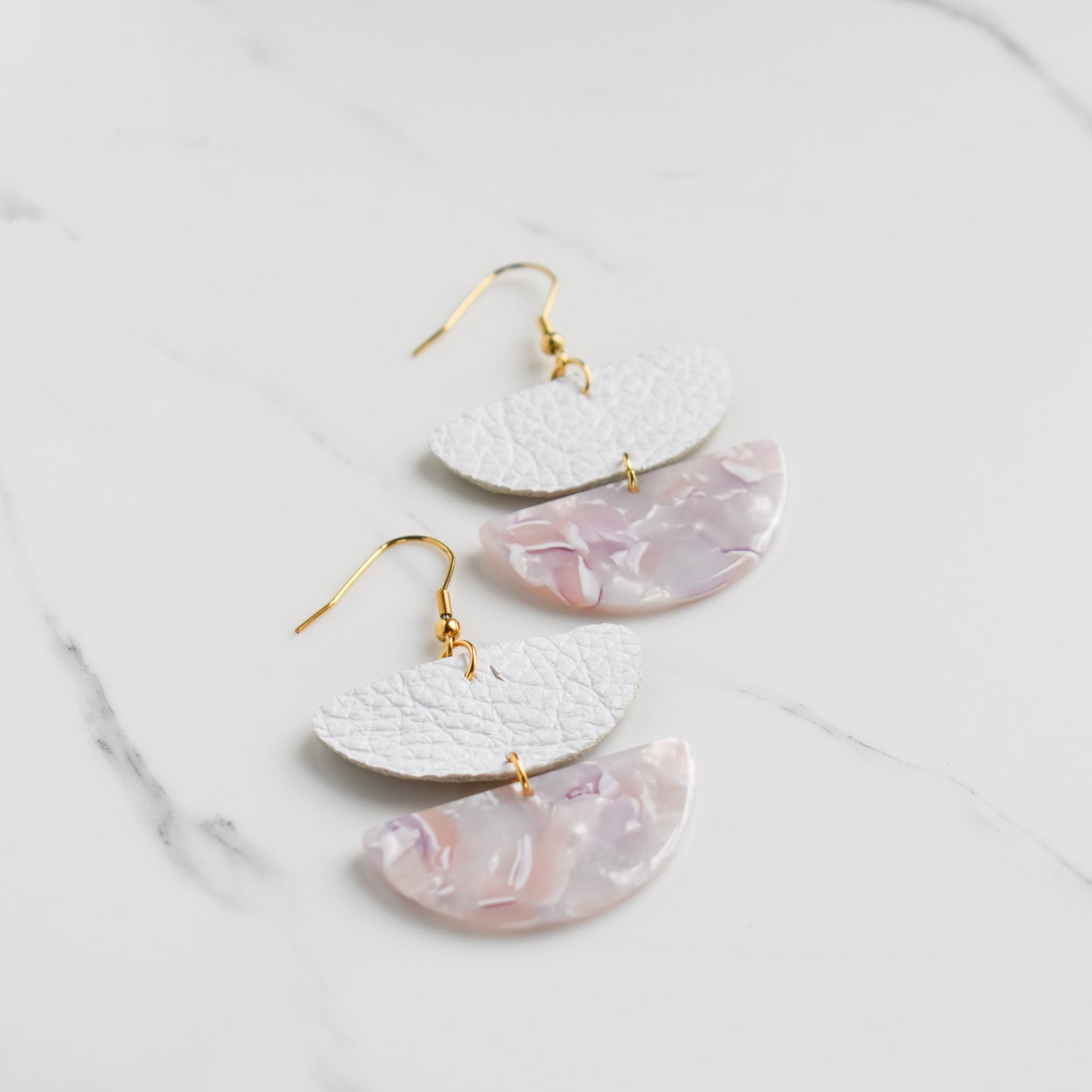 Handmade, light weight and comfortable to wear all day long leather earrings. All our earring hooks are made with a high quality stainless steel and they are hypo allergenic.  They will not tarnish or irritate your sensitive skin.