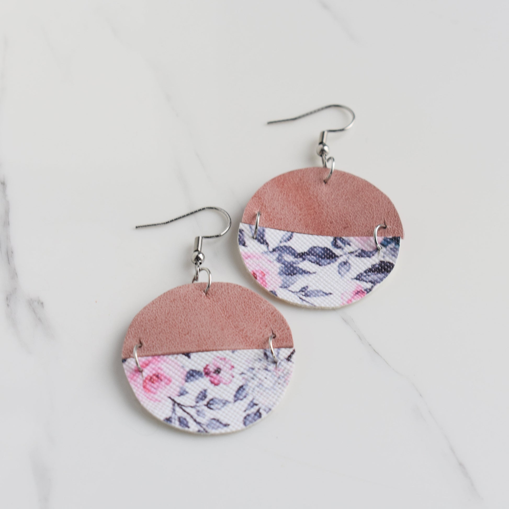 Handmade, light weight and comfortable to wear all day long leather earrings. All our earring hooks are made with a high quality stainless steel and they are hypo allergenic.  They will not tarnish or irritate your sensitive skin.