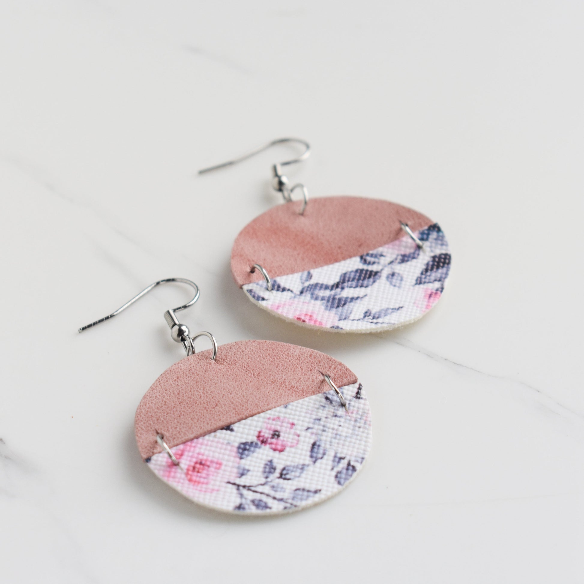 Handmade, light weight and comfortable to wear all day long leather earrings. All our earring hooks are made with a high quality stainless steel and they are hypo allergenic.  They will not tarnish or irritate your sensitive skin.