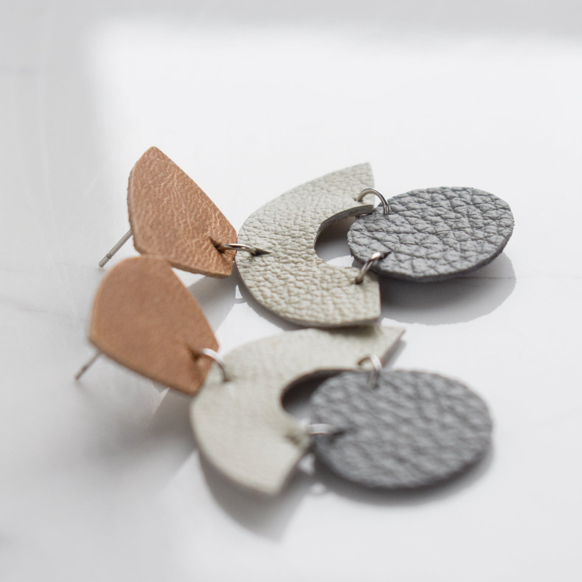 Handmade, light weight and comfortable to wear all day long leather earrings. All our earring hooks are made with a high quality stainless steel and they are hypo allergenic.  They will not tarnish or irritate your sensitive skin.