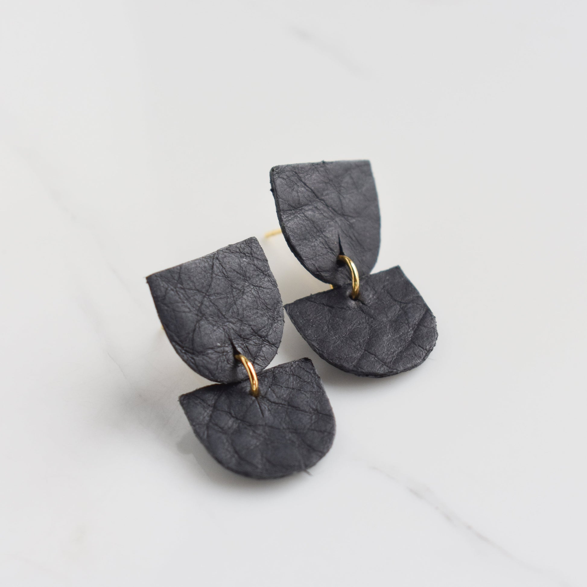 Handmade, light weight and comfortable to wear all day long leather earrings. All our earring hooks are made with a high quality stainless steel and they are hypo allergenic.  They will not tarnish or irritate your sensitive skin.