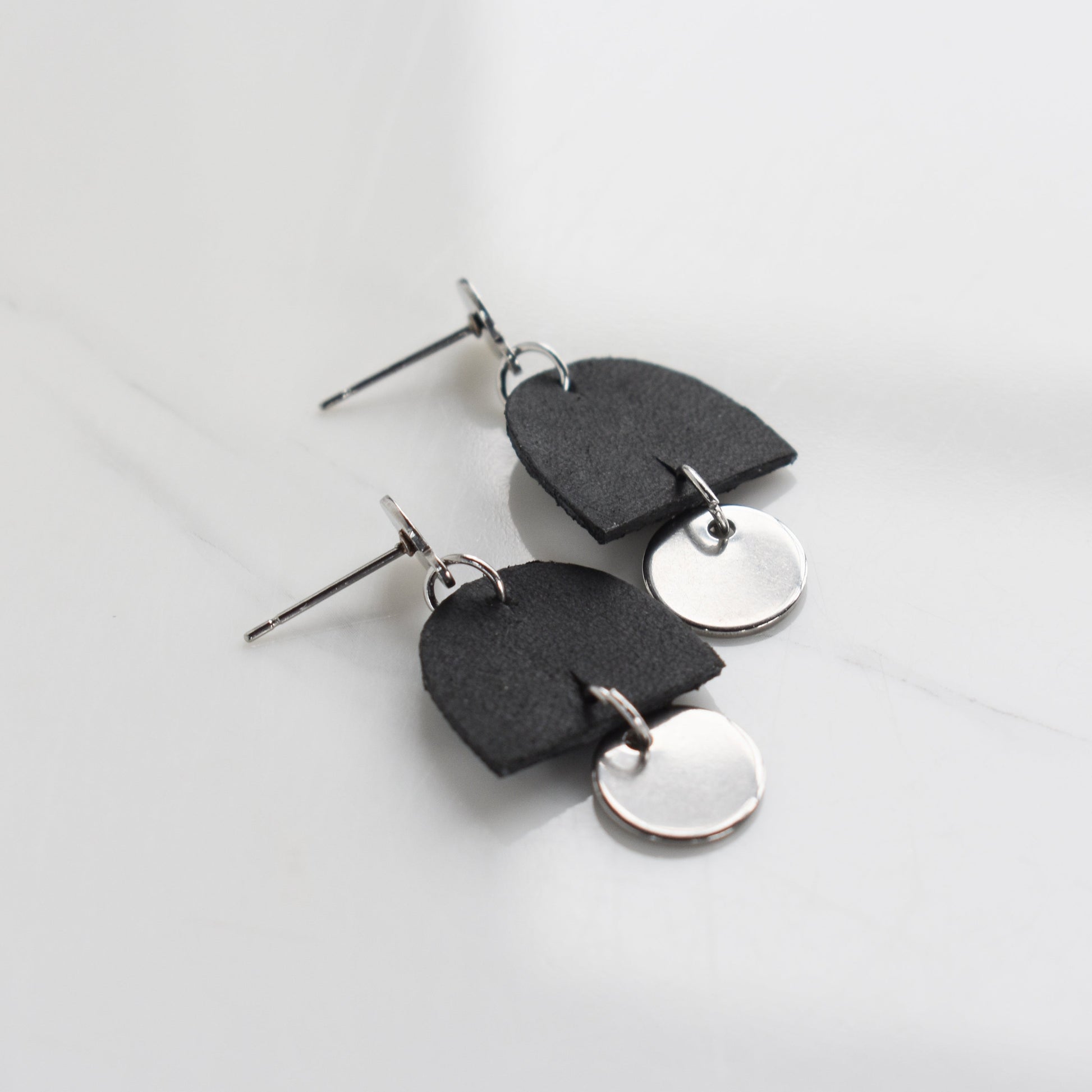 Handmade, light weight and comfortable to wear all day long leather earrings. All our earring hooks are made with a high quality stainless steel and they are hypo allergenic.  They will not tarnish or irritate your sensitive skin.