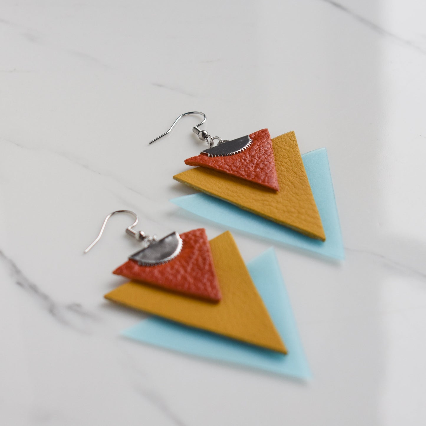 Handmade, light weight and comfortable to wear all day long leather earrings. All our earring hooks are made with a high quality stainless steel and they are hypo allergenic.  They will not tarnish or irritate your sensitive skin.