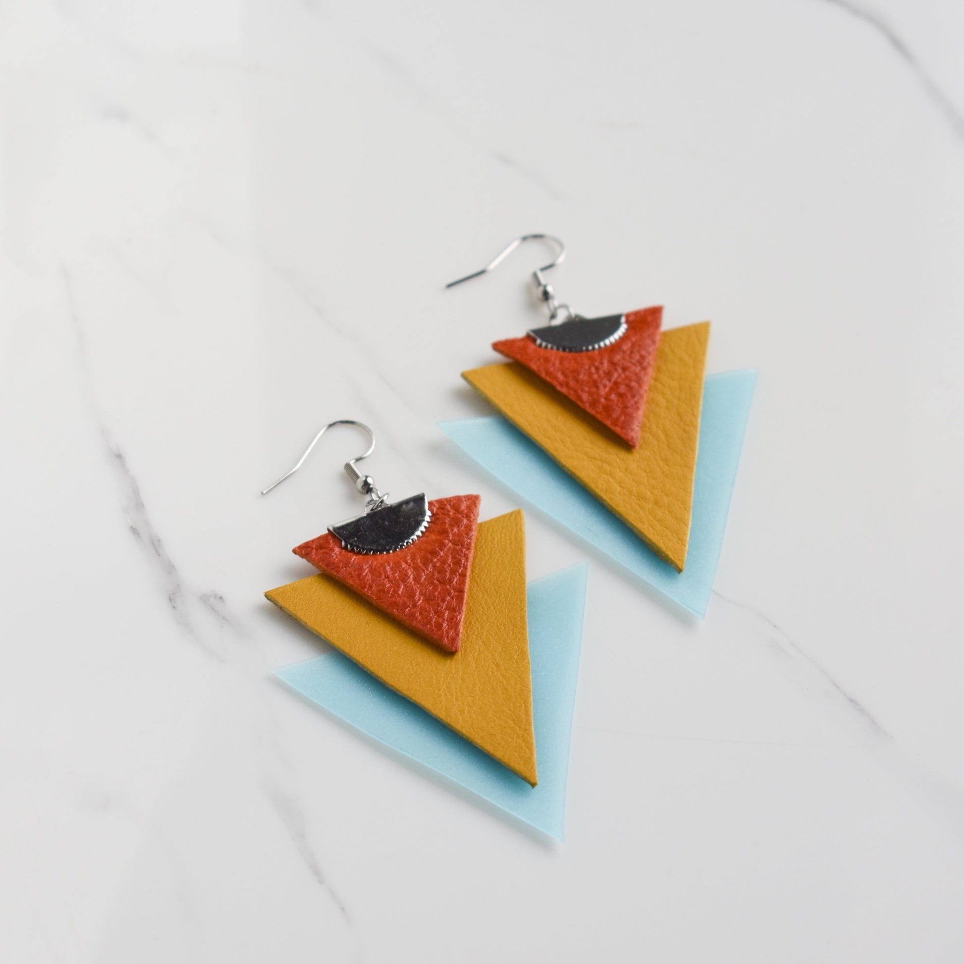 Handmade, light weight and comfortable to wear all day long leather earrings. All our earring hooks are made with a high quality stainless steel and they are hypo allergenic.  They will not tarnish or irritate your sensitive skin.