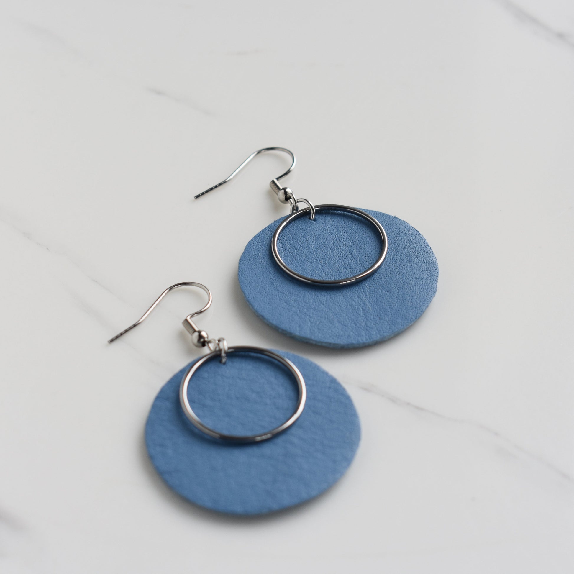 Handmade, light weight and comfortable to wear all day long leather earrings. All our earring hooks are made with a high quality stainless steel and they are hypo allergenic.  They will not tarnish or irritate your sensitive skin.