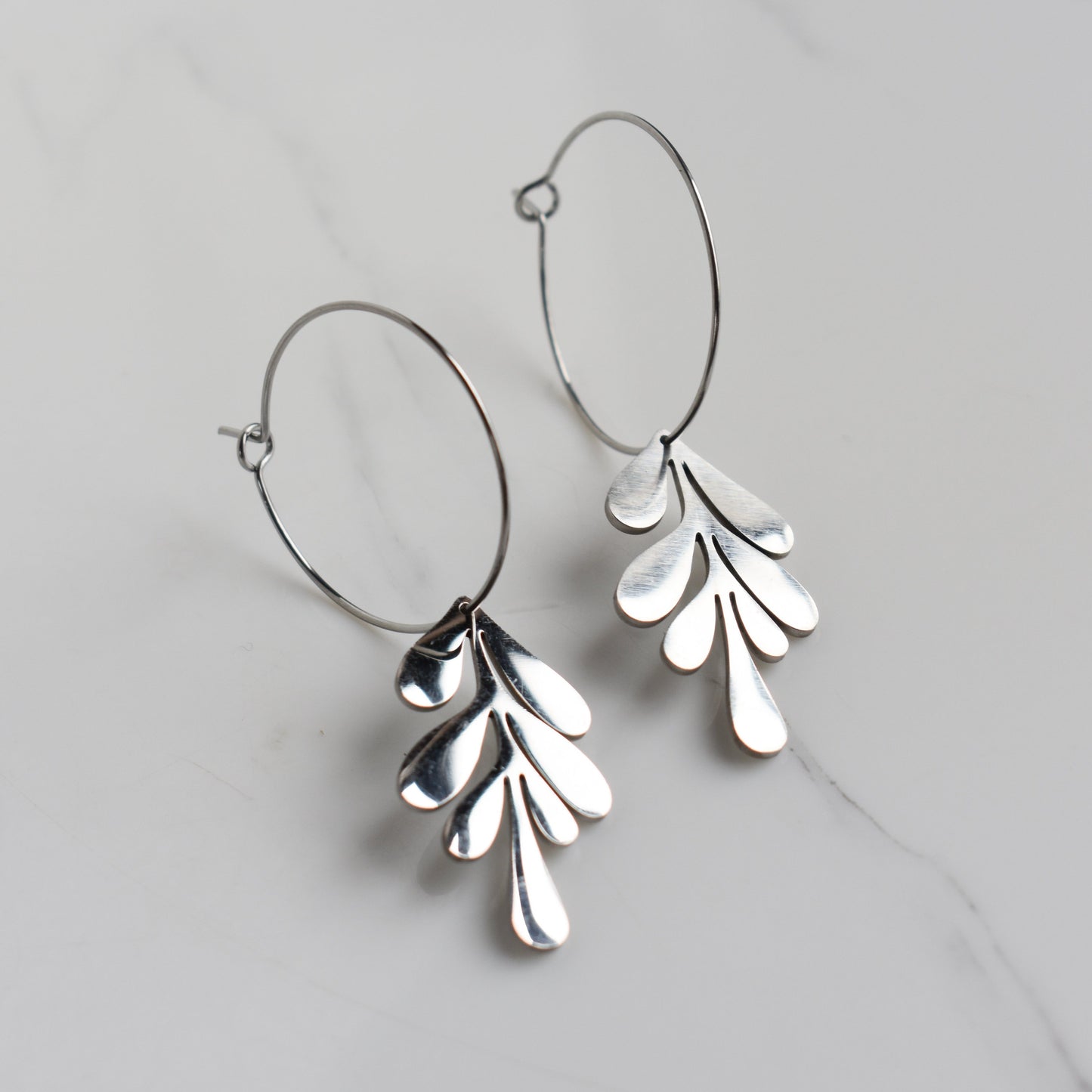 Handmade, light weight and comfortable to wear all day long leather earrings. All our earring hooks are made with a high quality stainless steel and they are hypo allergenic.  They will not tarnish or irritate your sensitive skin.