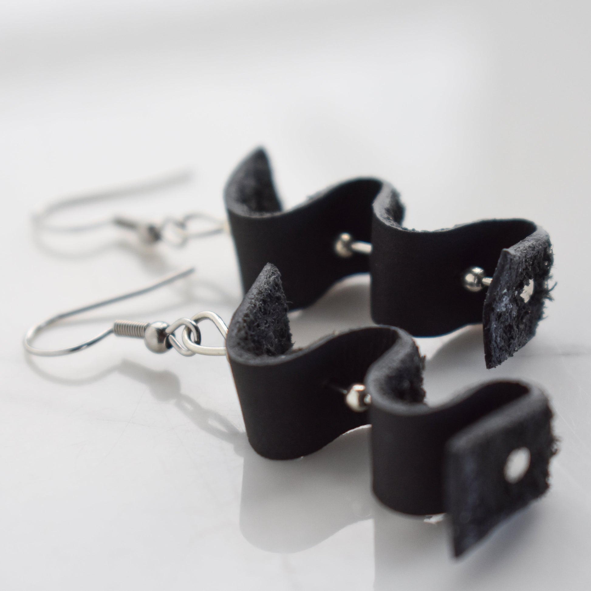 Handmade, light weight and comfortable to wear all day long leather earrings. All our earring hooks are made with a high quality stainless steel and they are hypo allergenic.  They will not tarnish or irritate your sensitive skin.