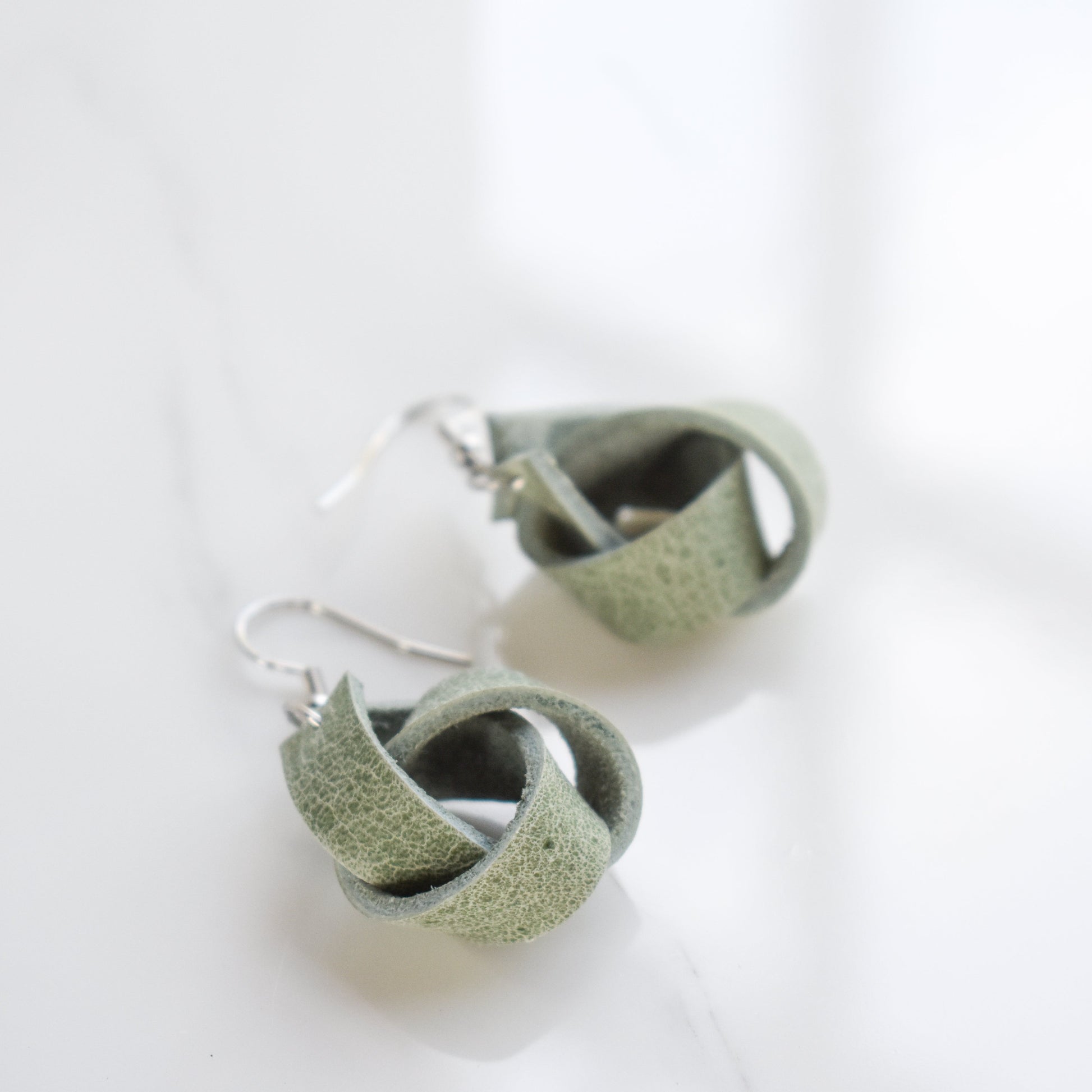 Handmade, light weight and comfortable to wear all day long leather earrings. All our earring hooks are made with a high quality stainless steel and they are hypo allergenic.  They will not tarnish or irritate your sensitive skin.