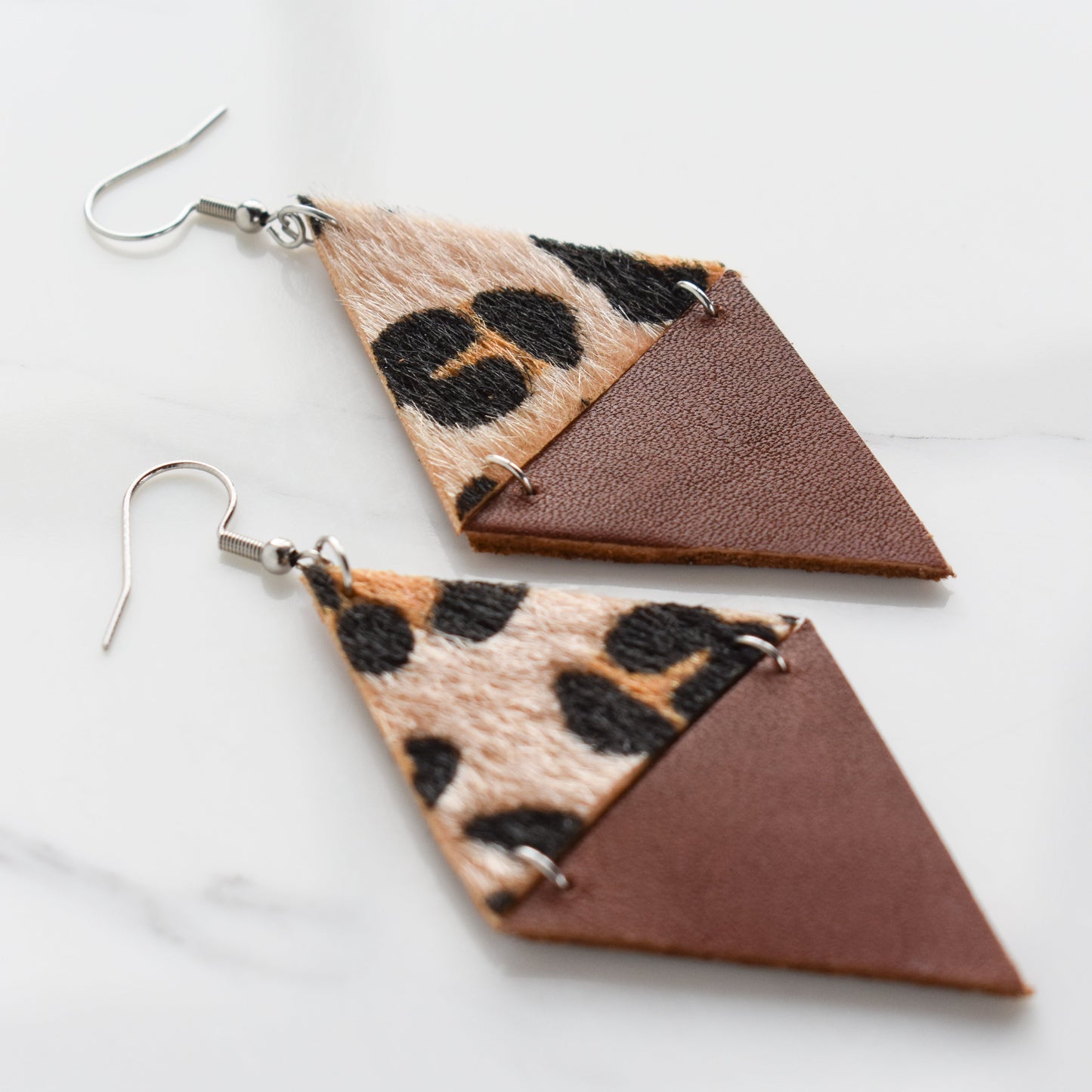 Handmade, light weight and comfortable to wear all day long leather earrings. All our earring hooks are made with a high quality stainless steel and they are hypo allergenic.  They will not tarnish or irritate your sensitive skin.