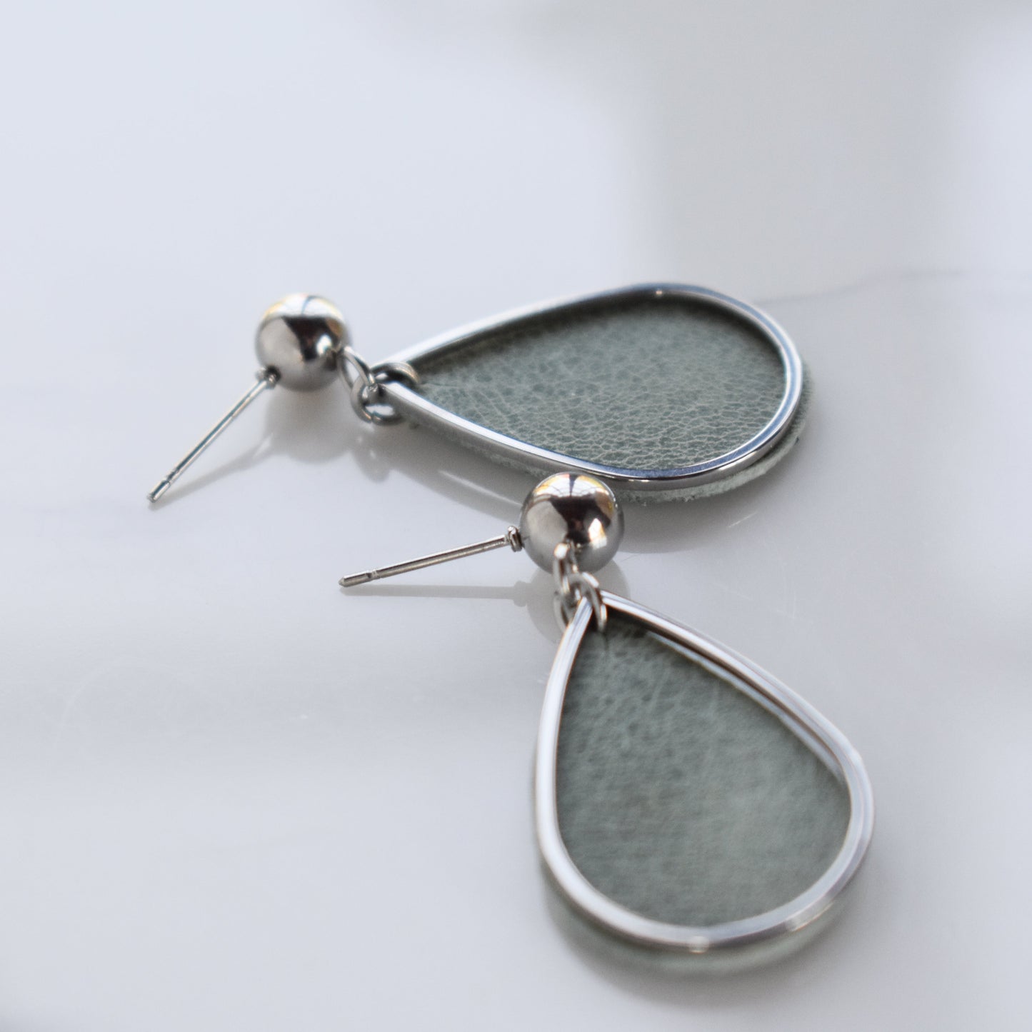 Handmade, light weight and comfortable to wear all day long leather earrings. All our earring hooks are made with a high quality stainless steel and they are hypo allergenic.  They will not tarnish or irritate your sensitive skin.