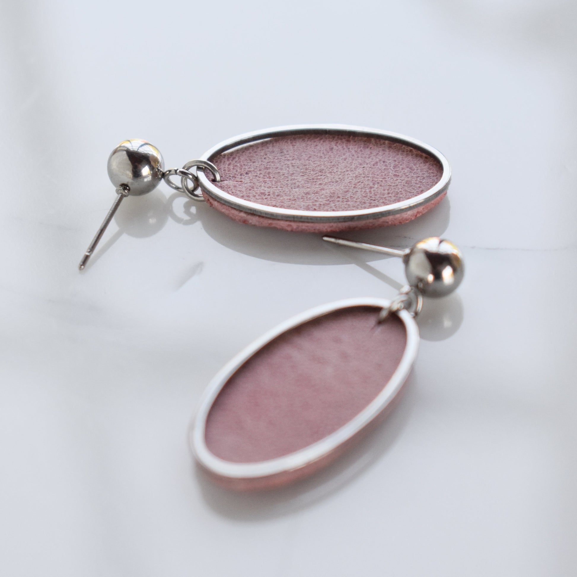 Handmade, light weight and comfortable to wear all day long leather earrings. All our earring hooks are made with a high quality stainless steel and they are hypo allergenic.  They will not tarnish or irritate your sensitive skin.