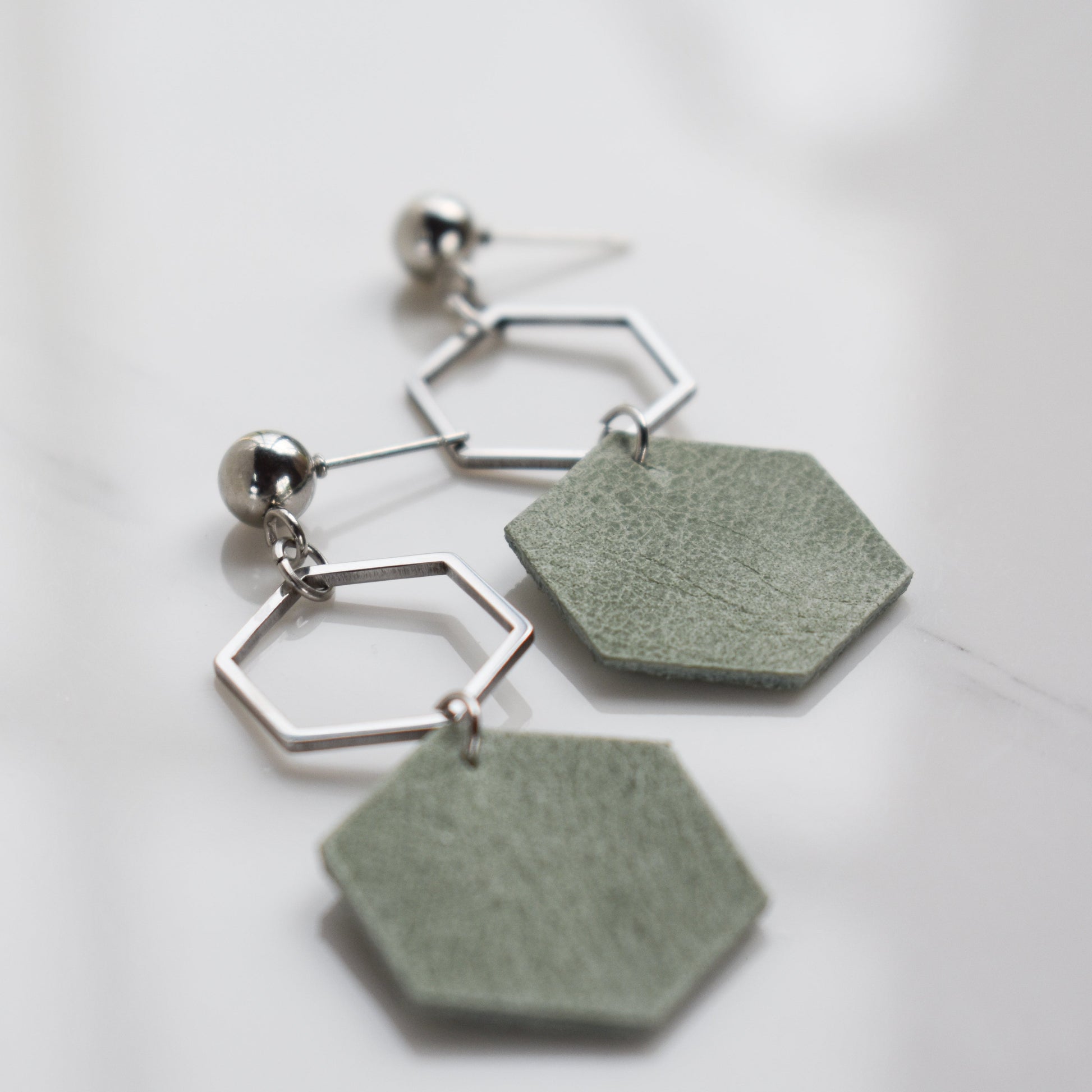 Handmade, light weight and comfortable to wear all day long leather earrings. All our earring hooks are made with a high quality stainless steel and they are hypo allergenic.  They will not tarnish or irritate your sensitive skin.