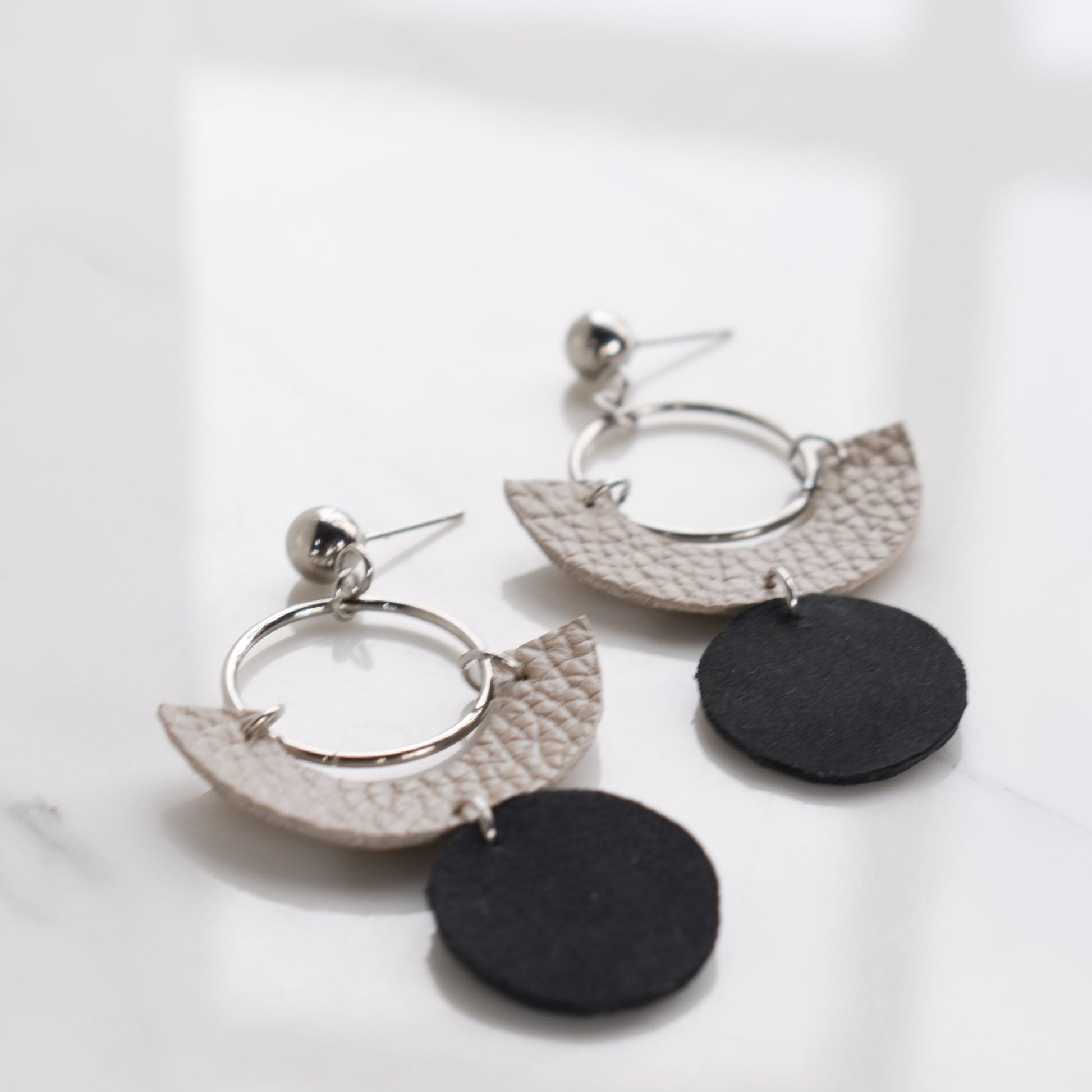 Handmade, light weight and comfortable to wear all day long leather earrings. All our earring hooks are made with a high quality stainless steel and they are hypo allergenic.  They will not tarnish or irritate your sensitive skin.