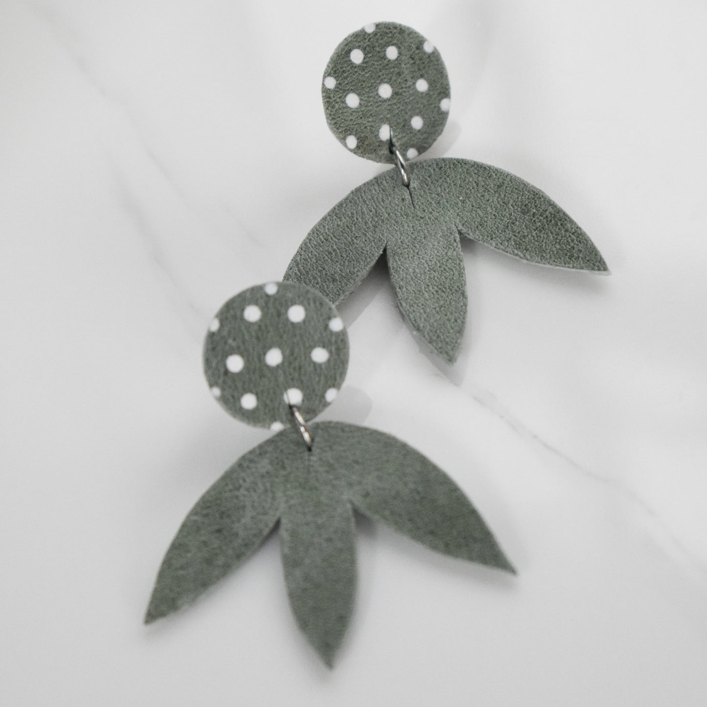 Handmade, light weight and comfortable to wear all day long leather earrings. All our earring hooks are made with a high quality stainless steel and they are hypo allergenic.  They will not tarnish or irritate your sensitive skin.