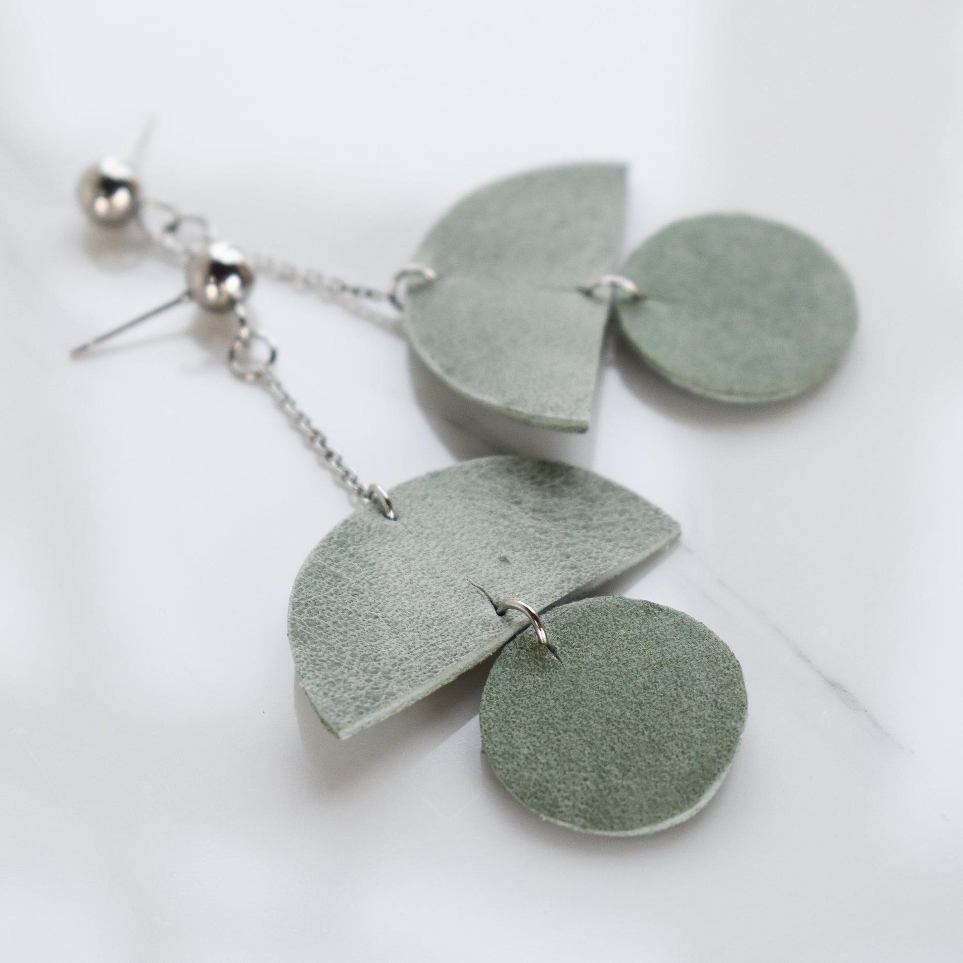 Handmade, light weight and comfortable to wear all day long leather earrings. All our earring hooks are made with a high quality stainless steel and they are hypo allergenic.  They will not tarnish or irritate your sensitive skin.