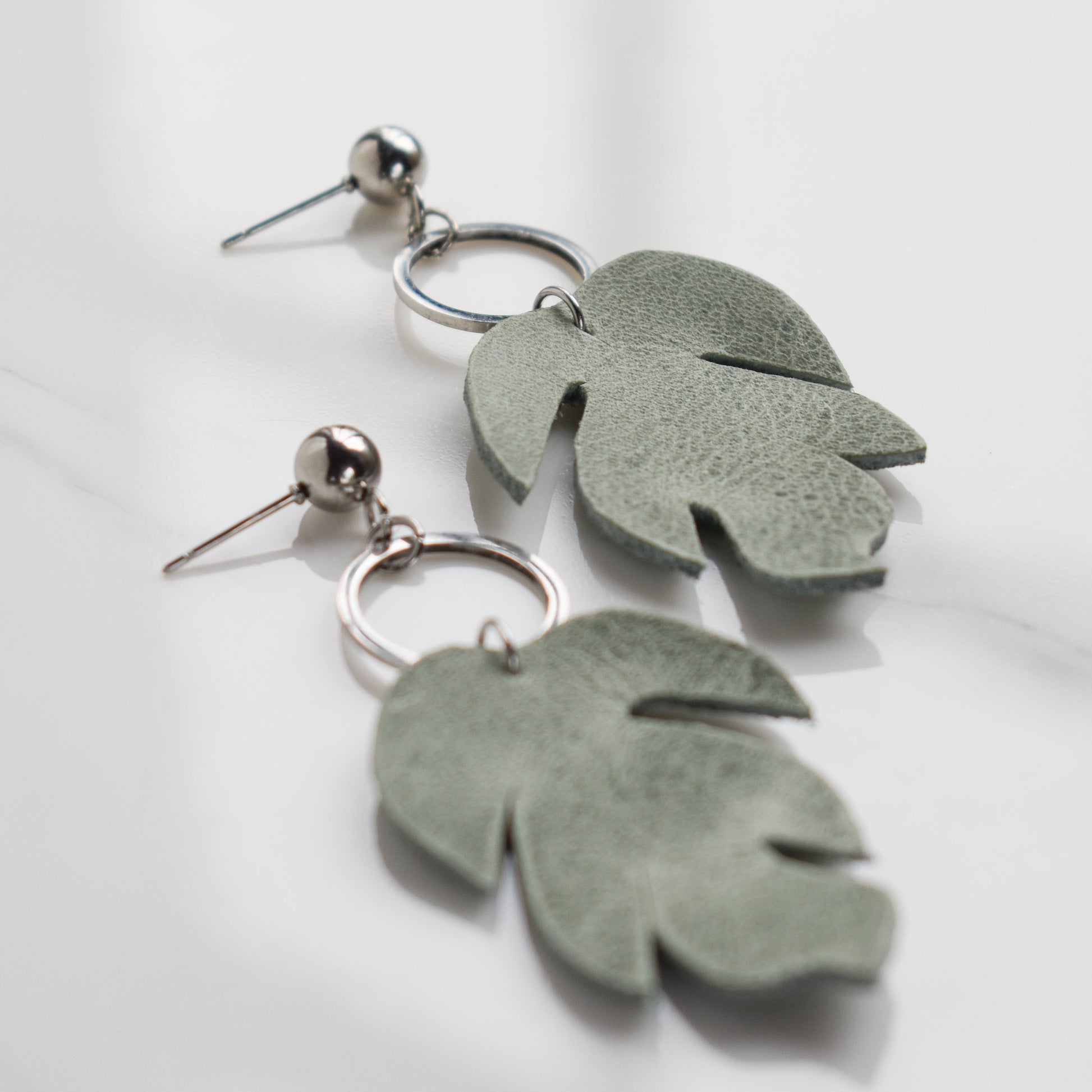 Handmade, light weight and comfortable to wear all day long leather earrings. All our earring hooks are made with a high quality stainless steel and they are hypo allergenic.  They will not tarnish or irritate your sensitive skin.