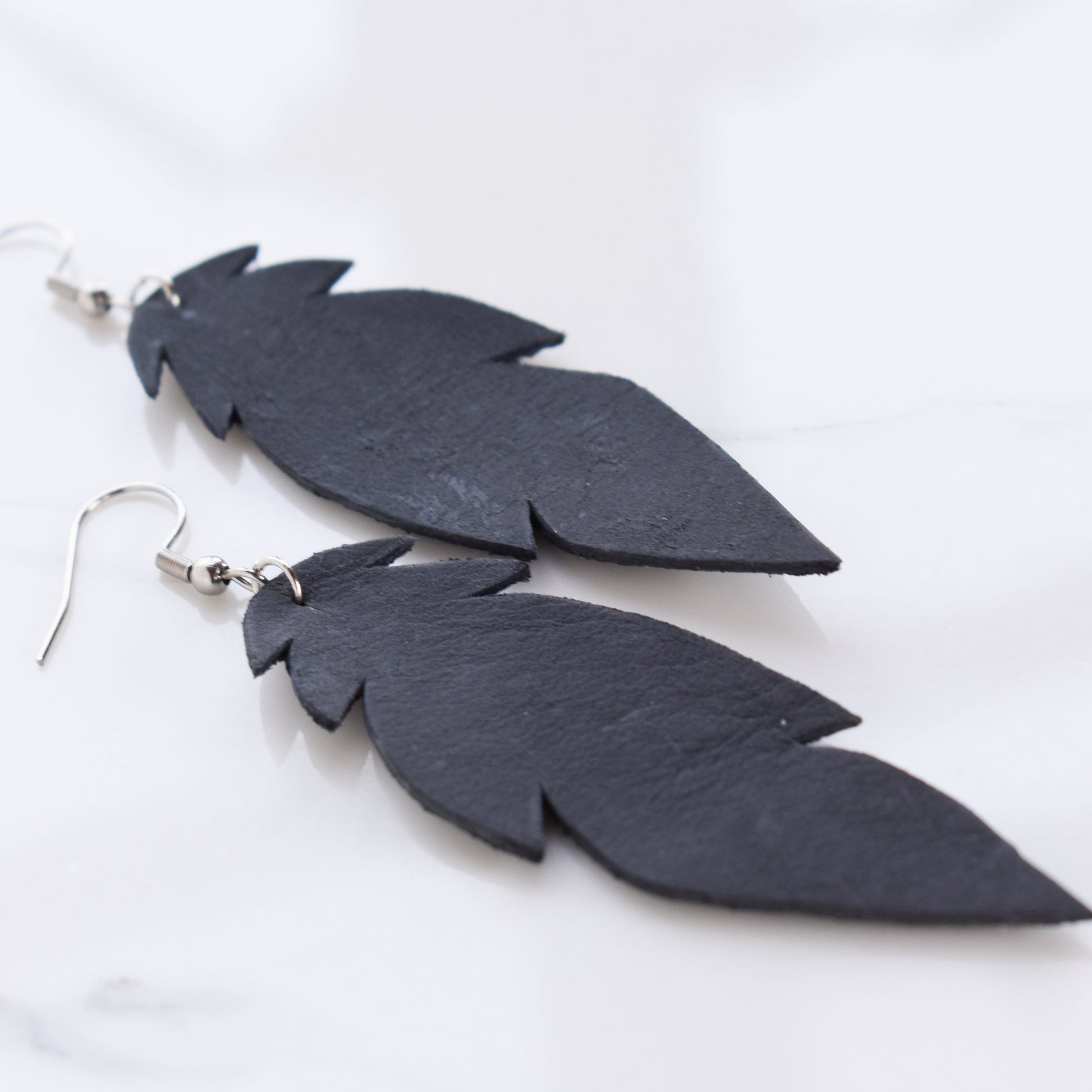 Handmade, light weight and comfortable to wear all day long leather earrings. All our earring hooks are made with a high quality stainless steel and they are hypo allergenic.  They will not tarnish or irritate your sensitive skin.