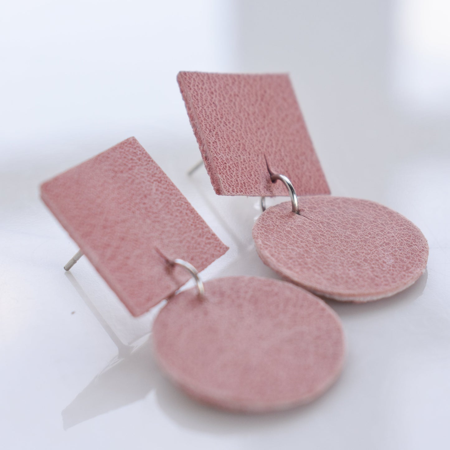 Handmade, light weight and comfortable to wear all day long leather earrings. All our earring hooks are made with a high quality stainless steel and they are hypo allergenic.  They will not tarnish or irritate your sensitive skin.