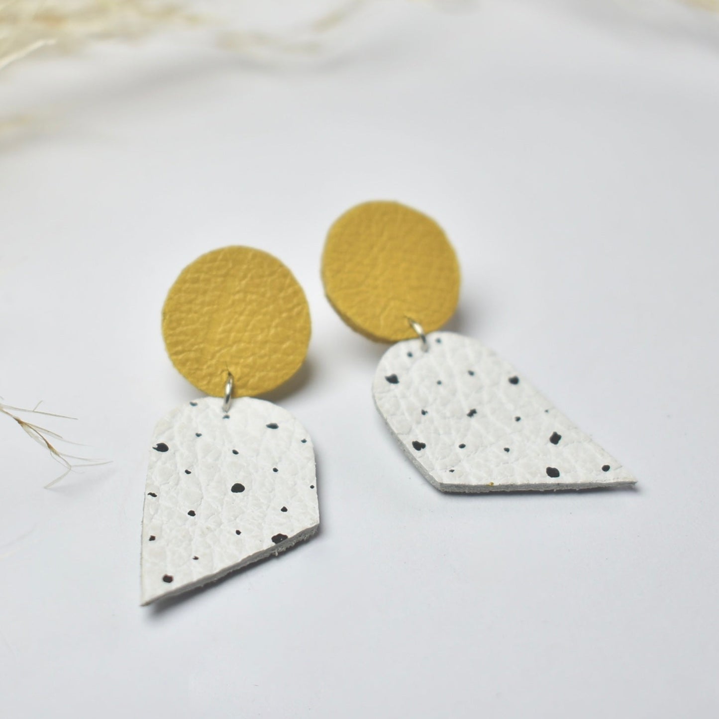 Handmade, light weight and comfortable to wear all day long leather earrings. All our earring hooks are made with a high quality stainless steel and they are hypo allergenic.  They will not tarnish or irritate your sensitive skin.