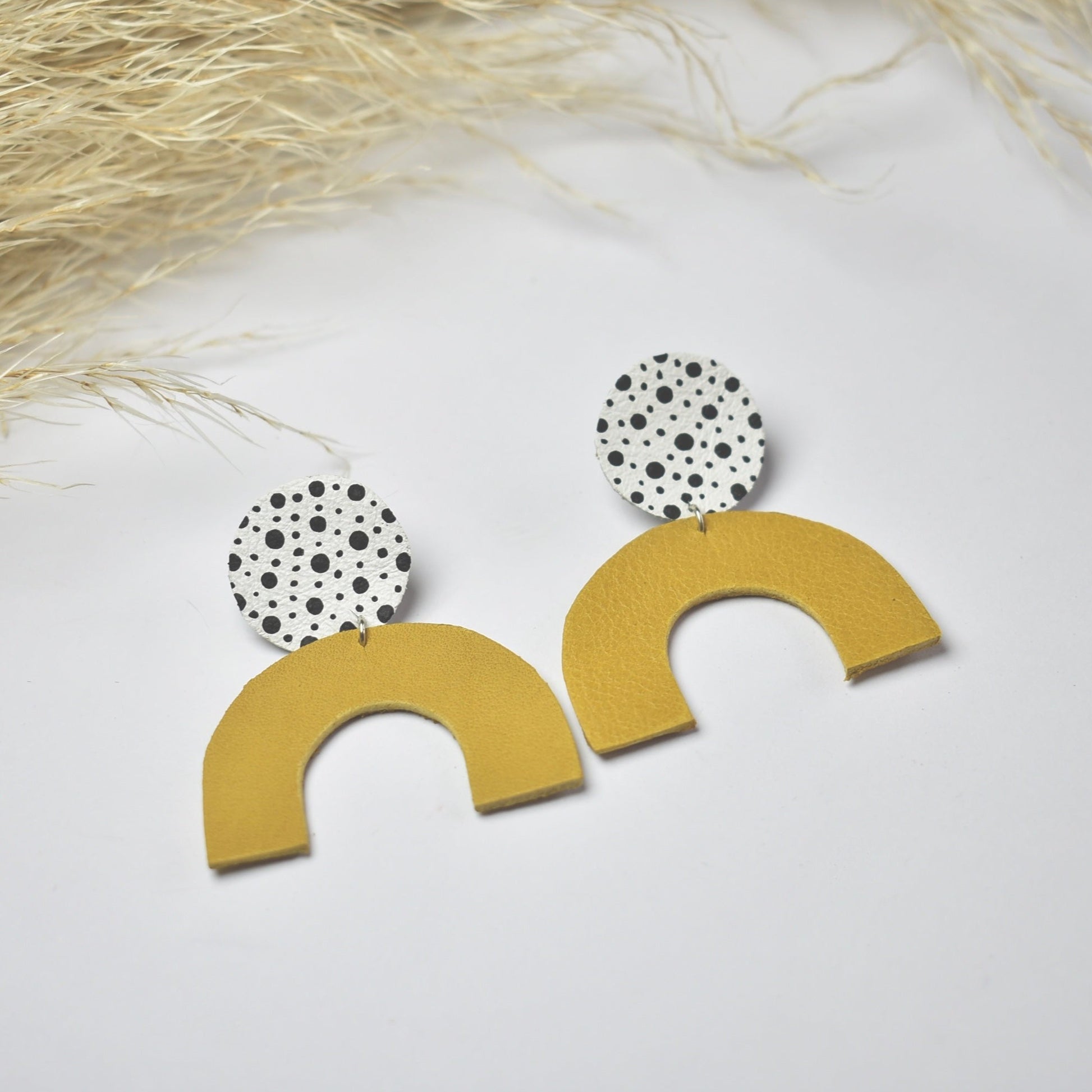 Handmade, light weight and comfortable to wear all day long leather earrings. All our earring hooks are made with a high quality stainless steel and they are hypo allergenic.  They will not tarnish or irritate your sensitive skin.